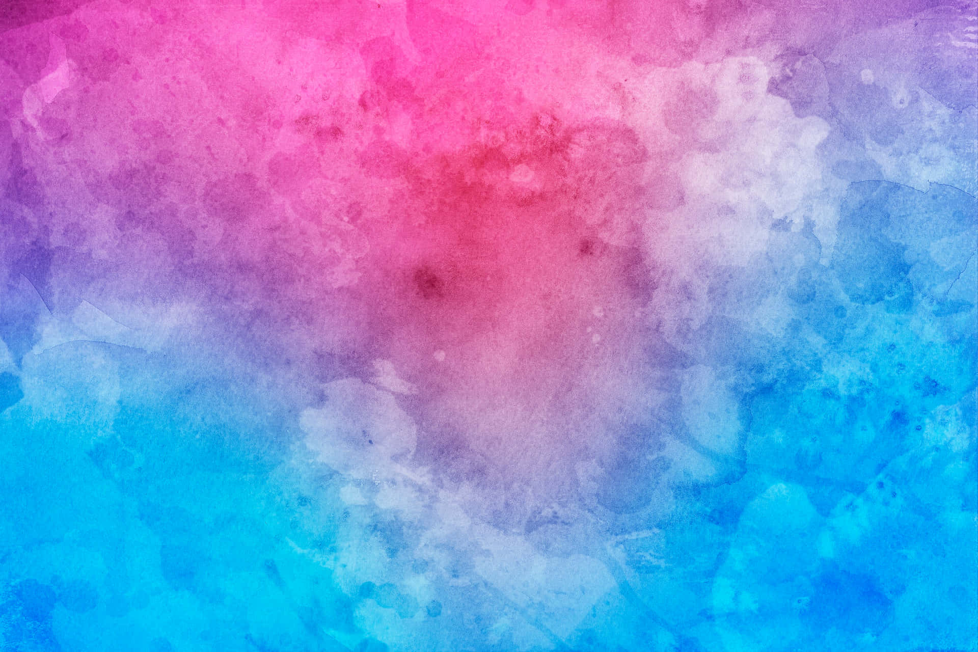 a watercolor background with blue and pink colors