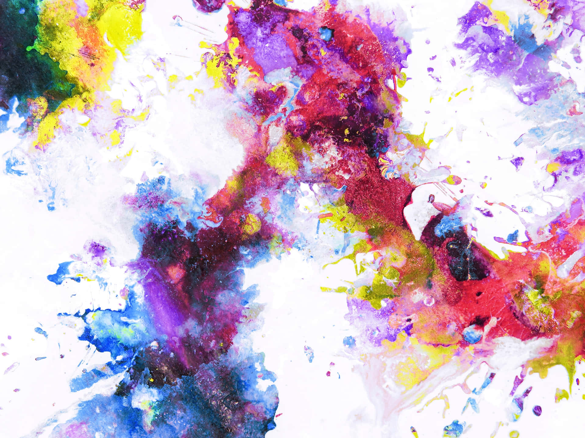 a colorful painting with paint splatters on it