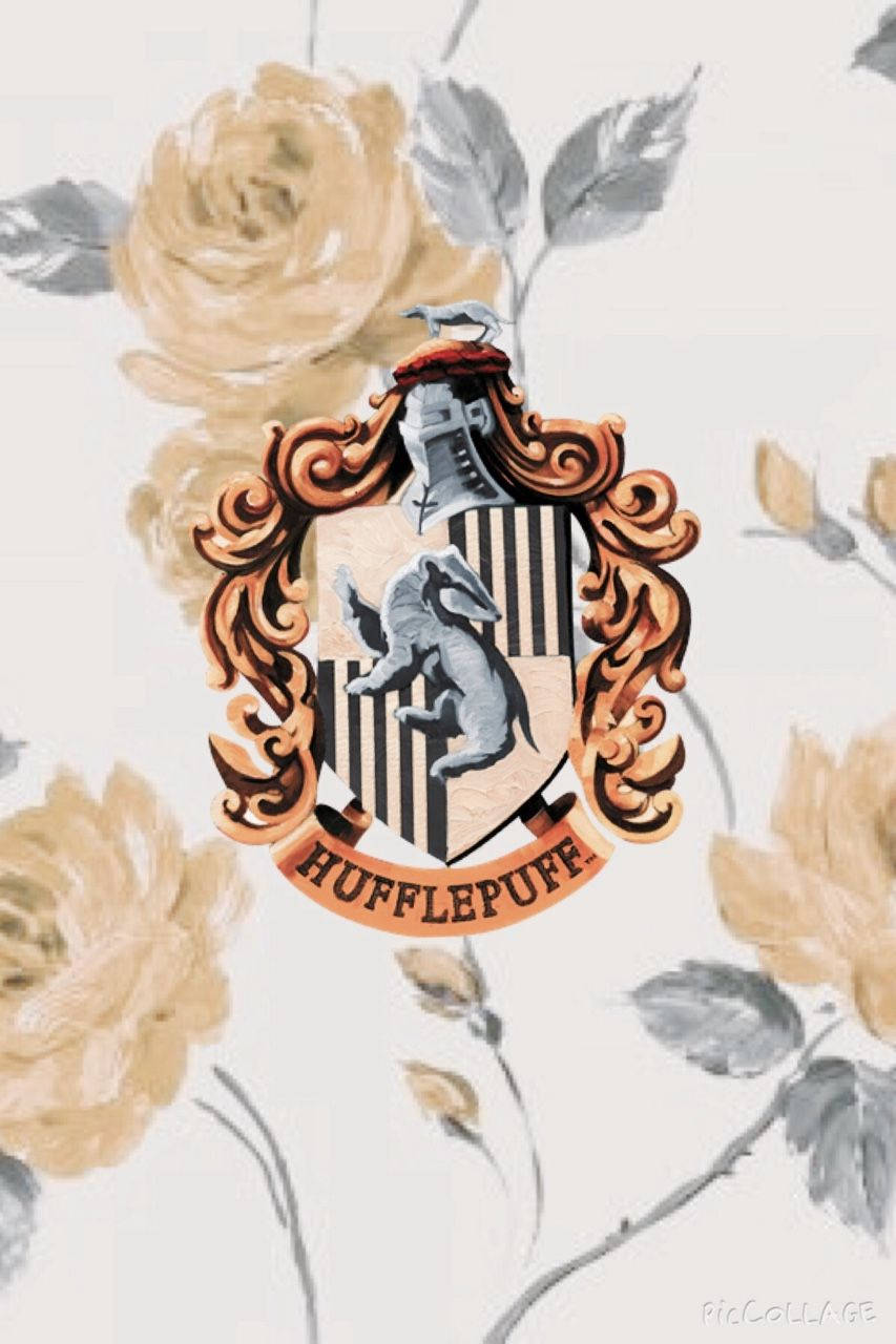 Represent your house with pride with this Watercolor Hufflepuff Logo Wallpaper Wallpaper