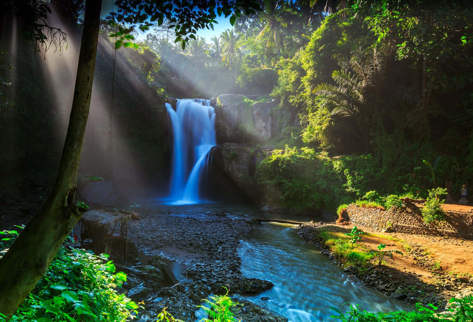 Enjoy the beauty of the peaceful waterfall scenery