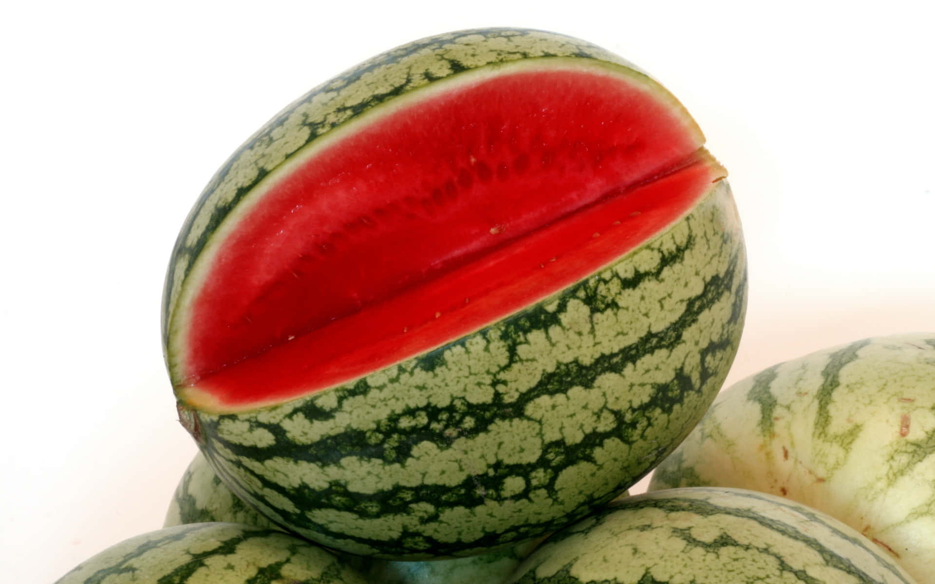 Saftigutsikt Över Röda Köttiga Vattenmeloner Som Bakgrund
