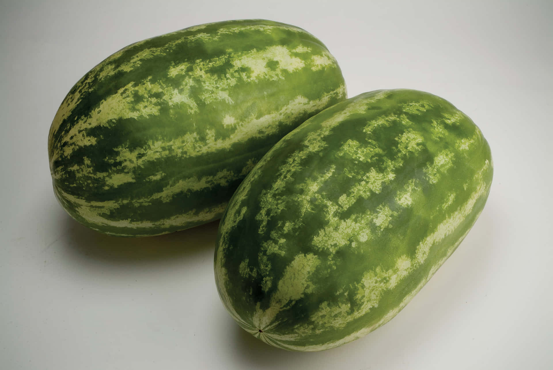 Attraktiverhintergrund Mit Zwei Ovalen Wassermelonen