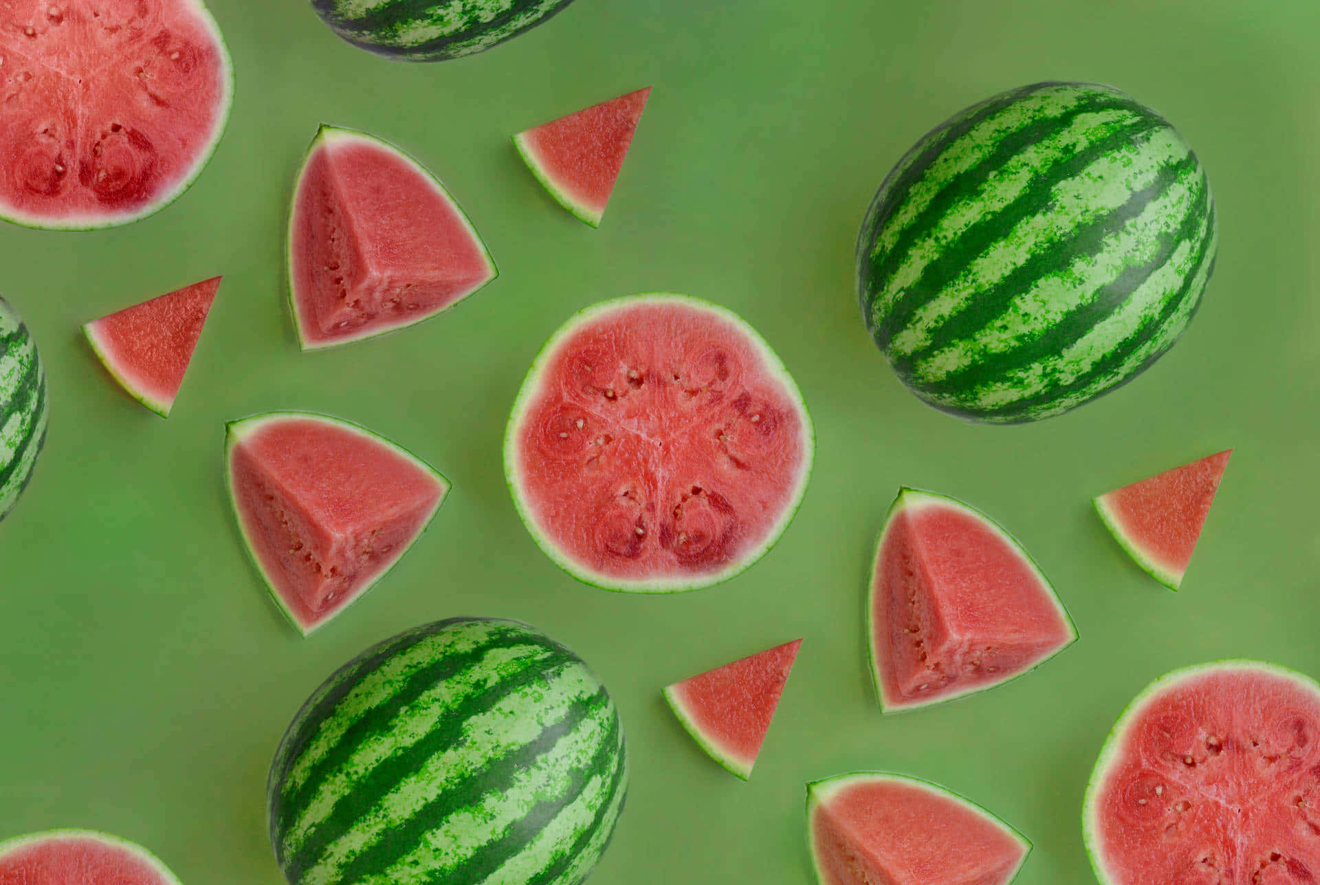 Leckereshintergrundbild Mit Mehreren In Scheiben Geschnittenen Und Ungeschnittenen Wassermelonen.
