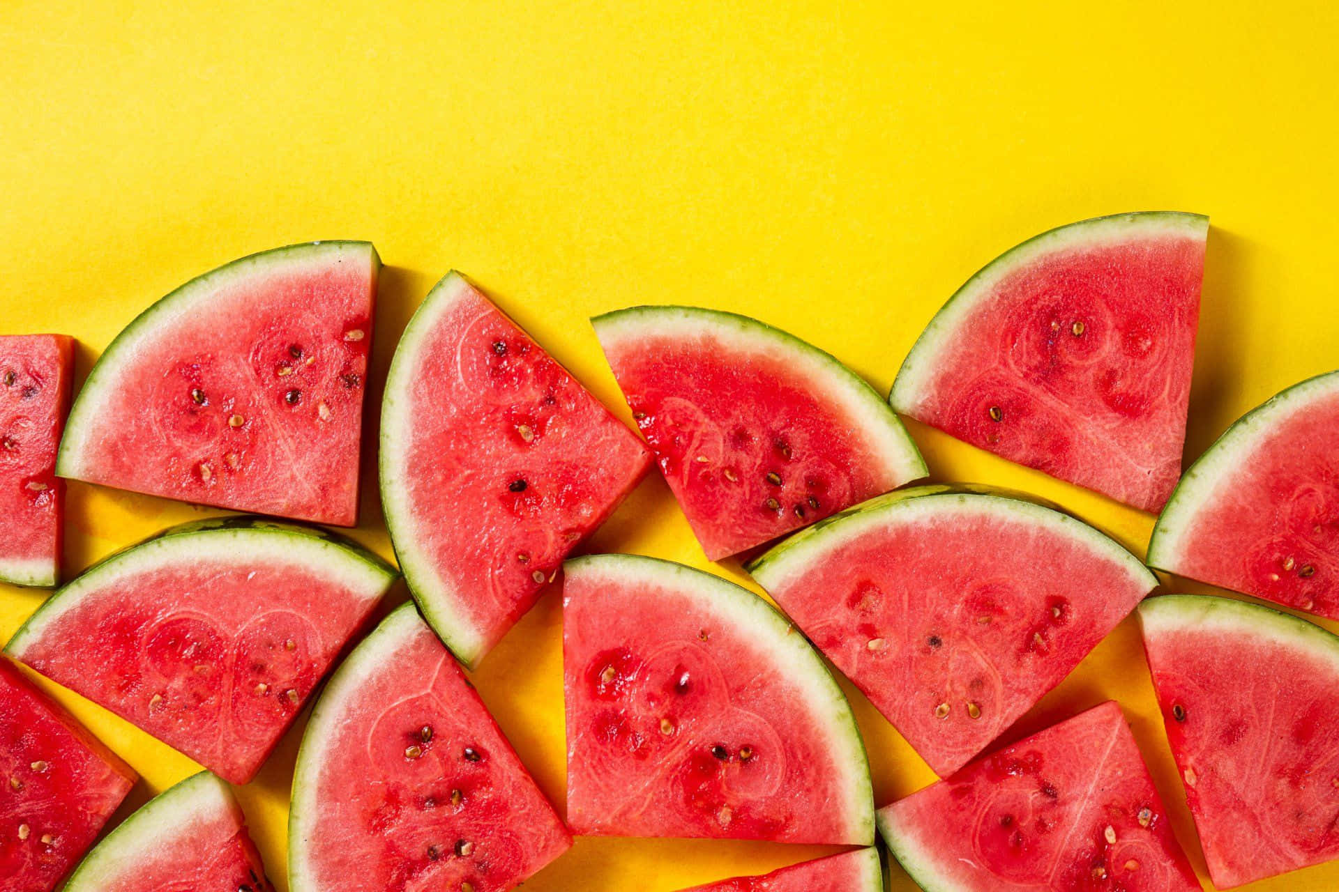 Aesthetic Triangular Sliced Watermelons Background