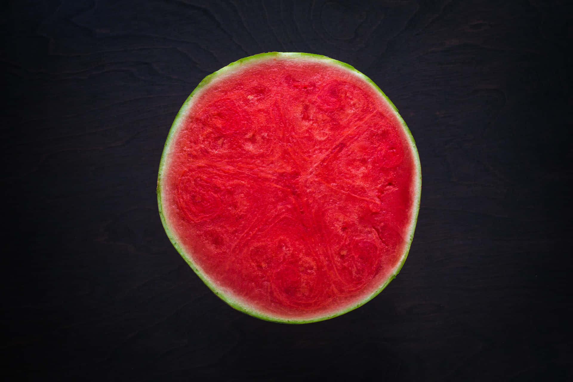 Yummy Half-Sliced In Circle Watermelon Background