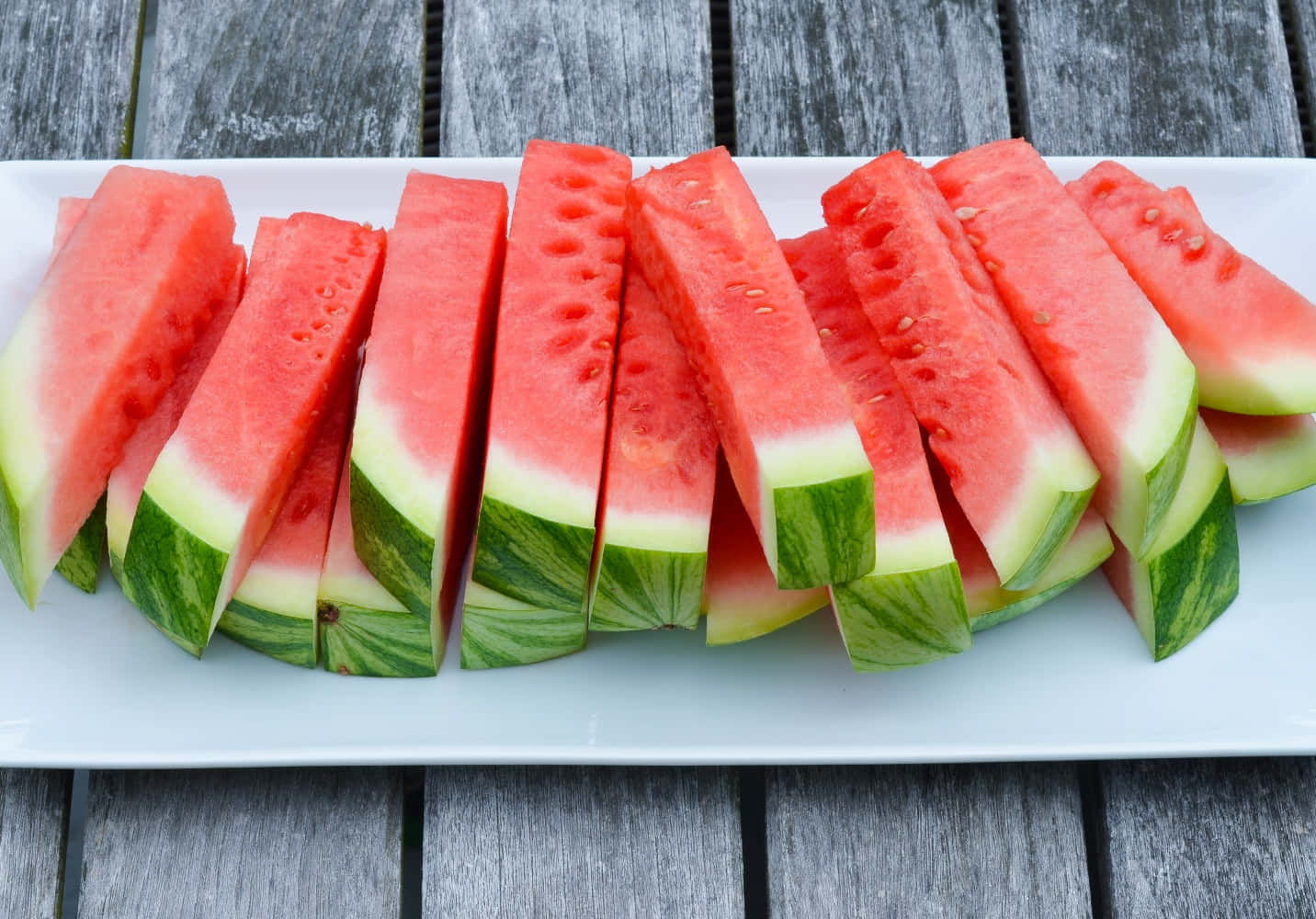 Watermelon Slices On A White Plate