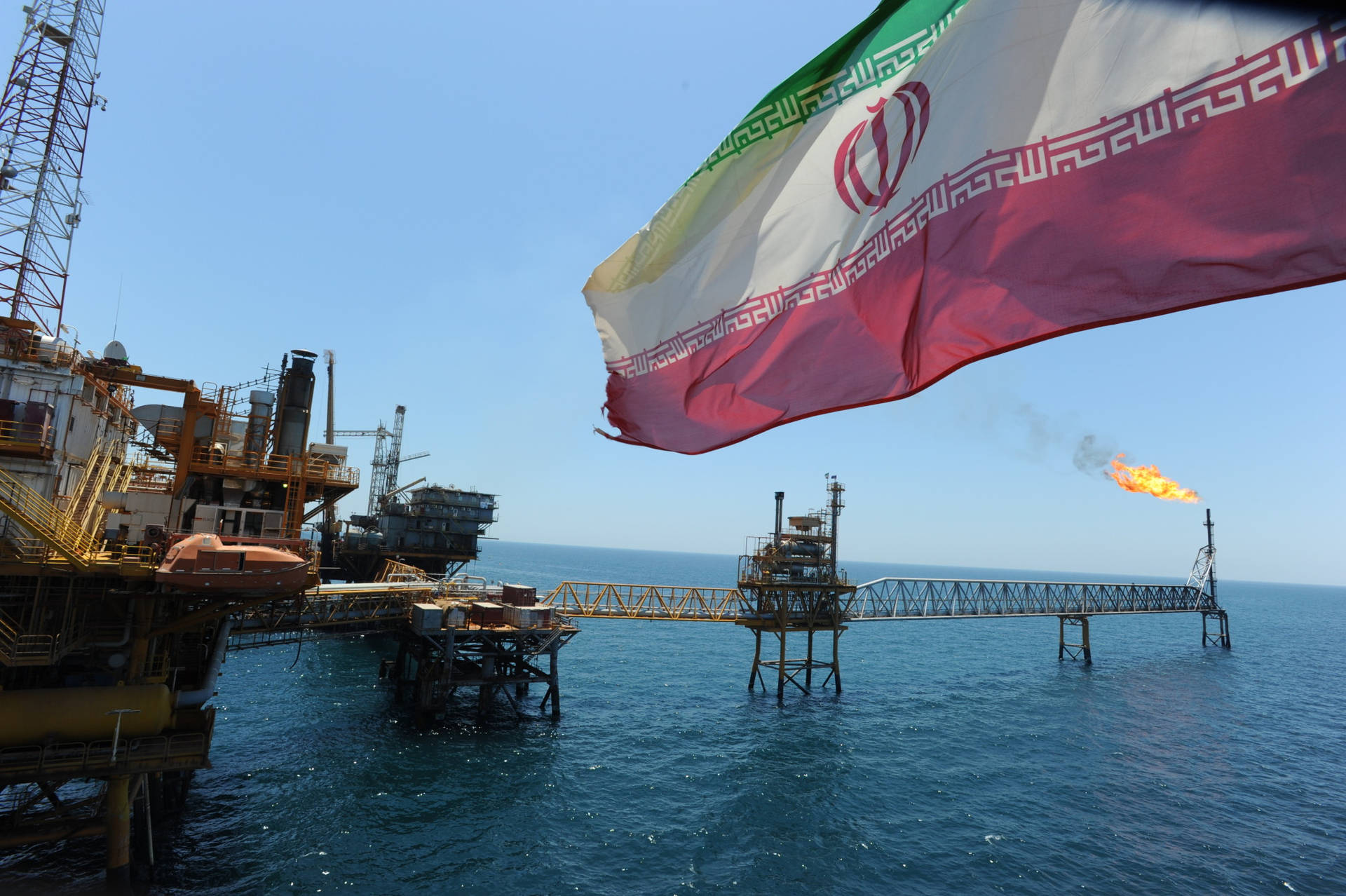 Waving Iran Flag By Sea Wallpaper