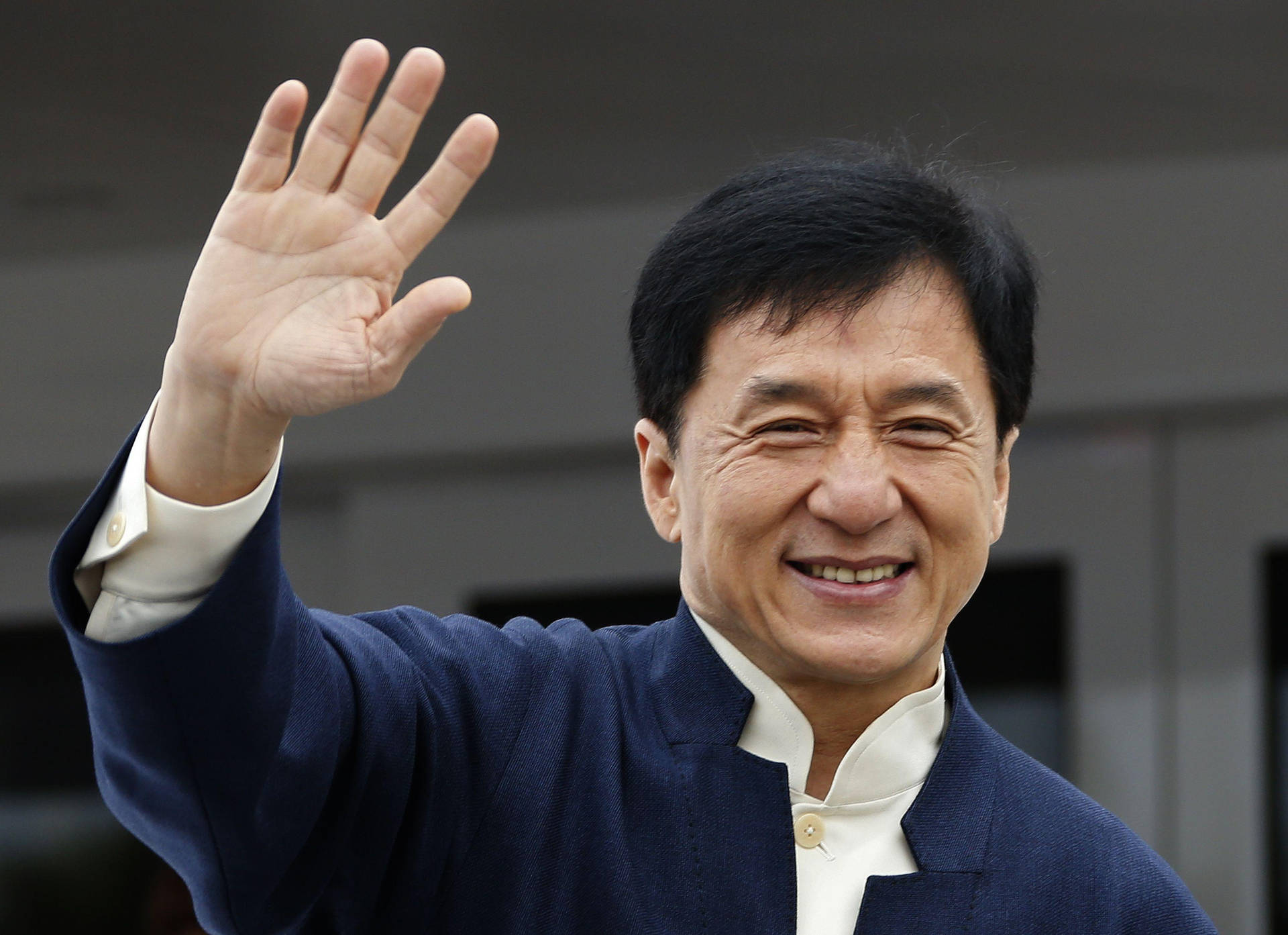 Jackie Chan Cheerfully Waving Wallpaper