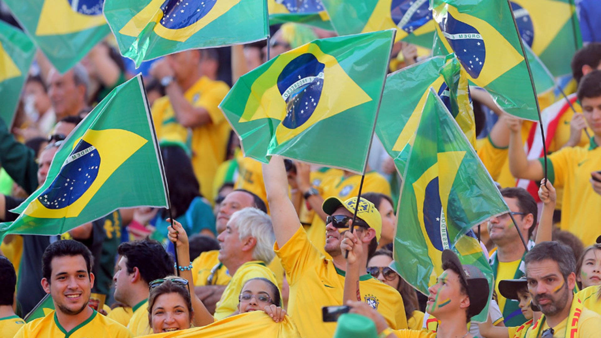 A Vibrant Waving Mini Brazil Flag Wallpaper
