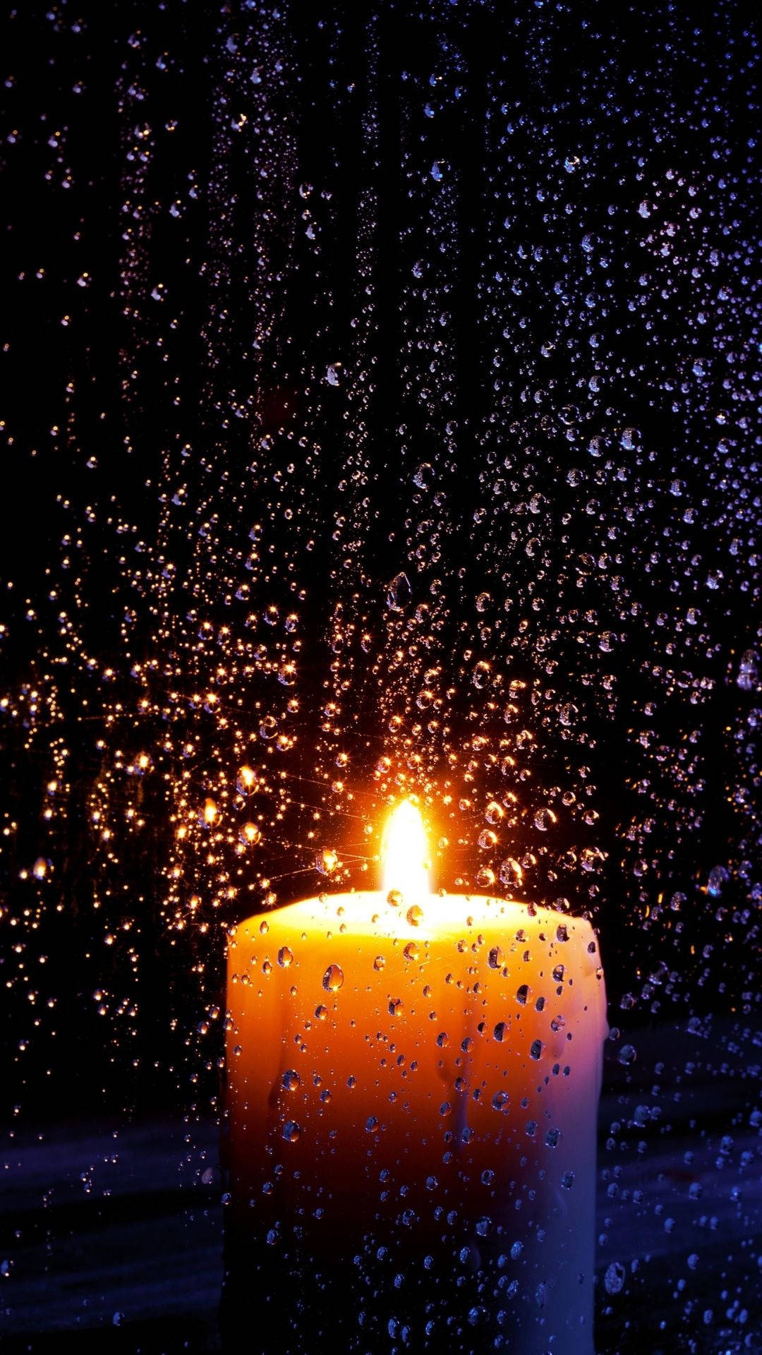 An Enchanting Wax Candle by the Window Wallpaper