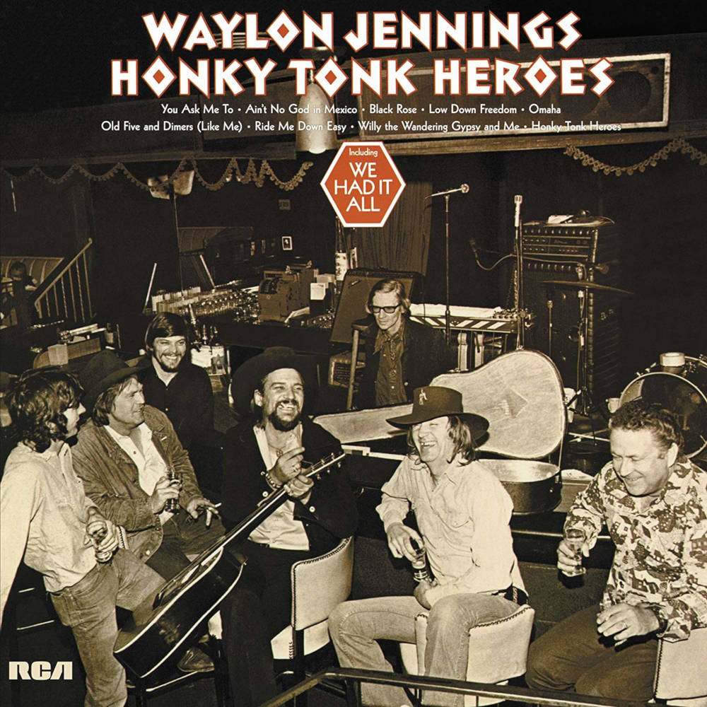 Waylon Jennings Honky Tonk Heroes sangteksten børstes truet med en lysere baggrund. Wallpaper