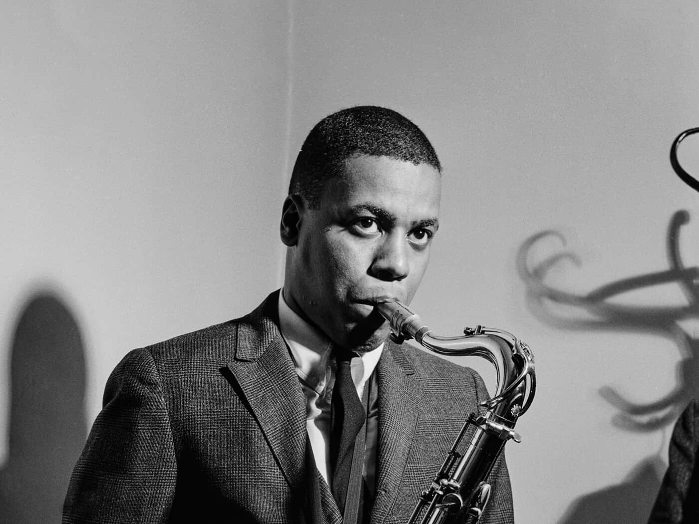 Wayne Shorter performing on stage with his saxophone Wallpaper