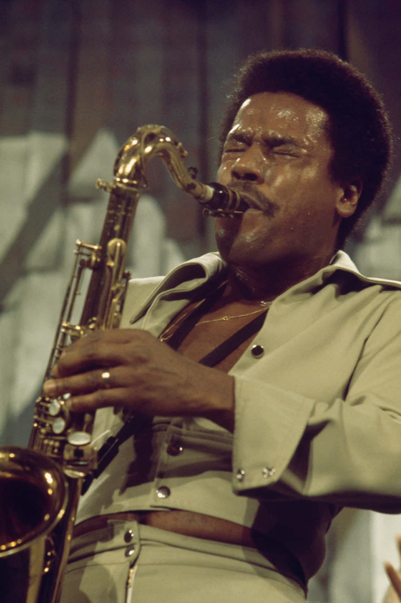 Wayne Shorter on stage with his saxophone Wallpaper
