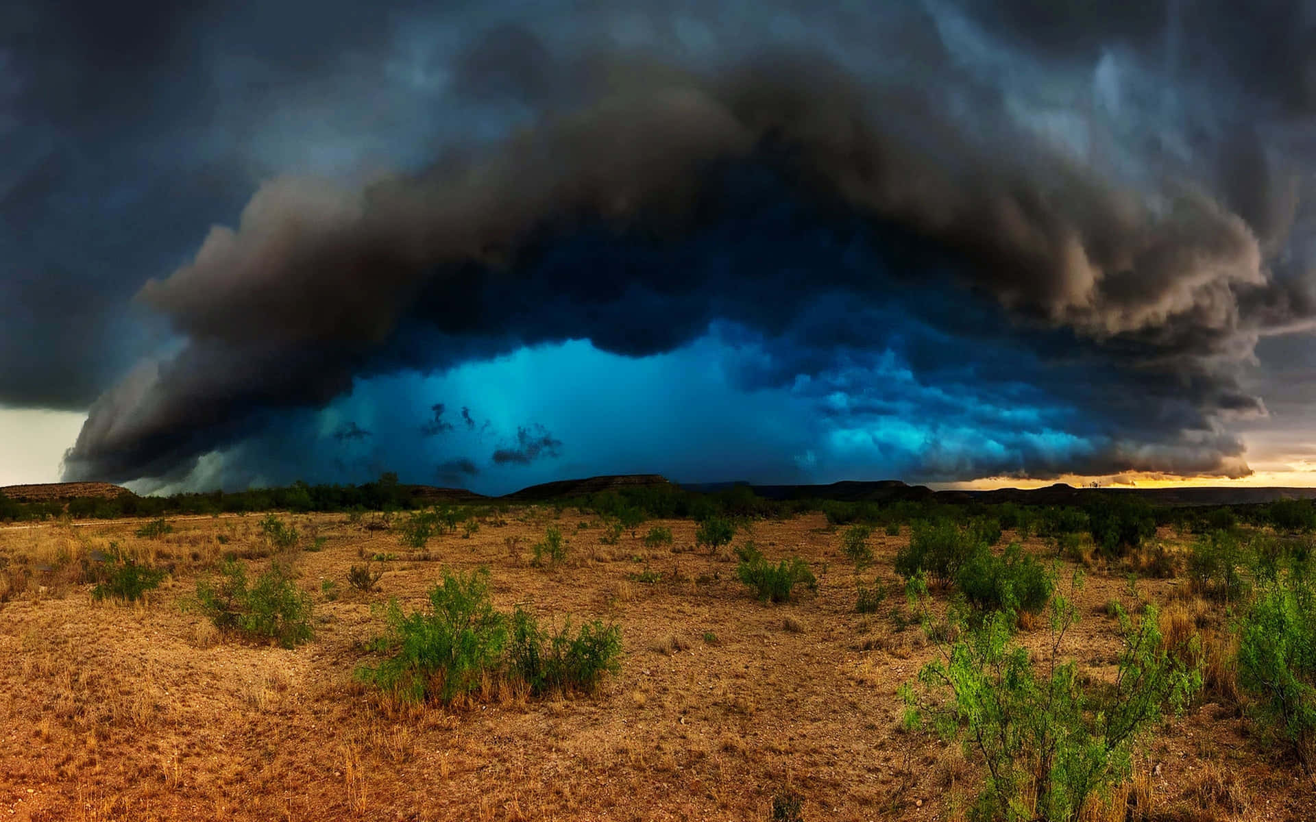 A Large Storm Cloud Is Seen Over The Desert