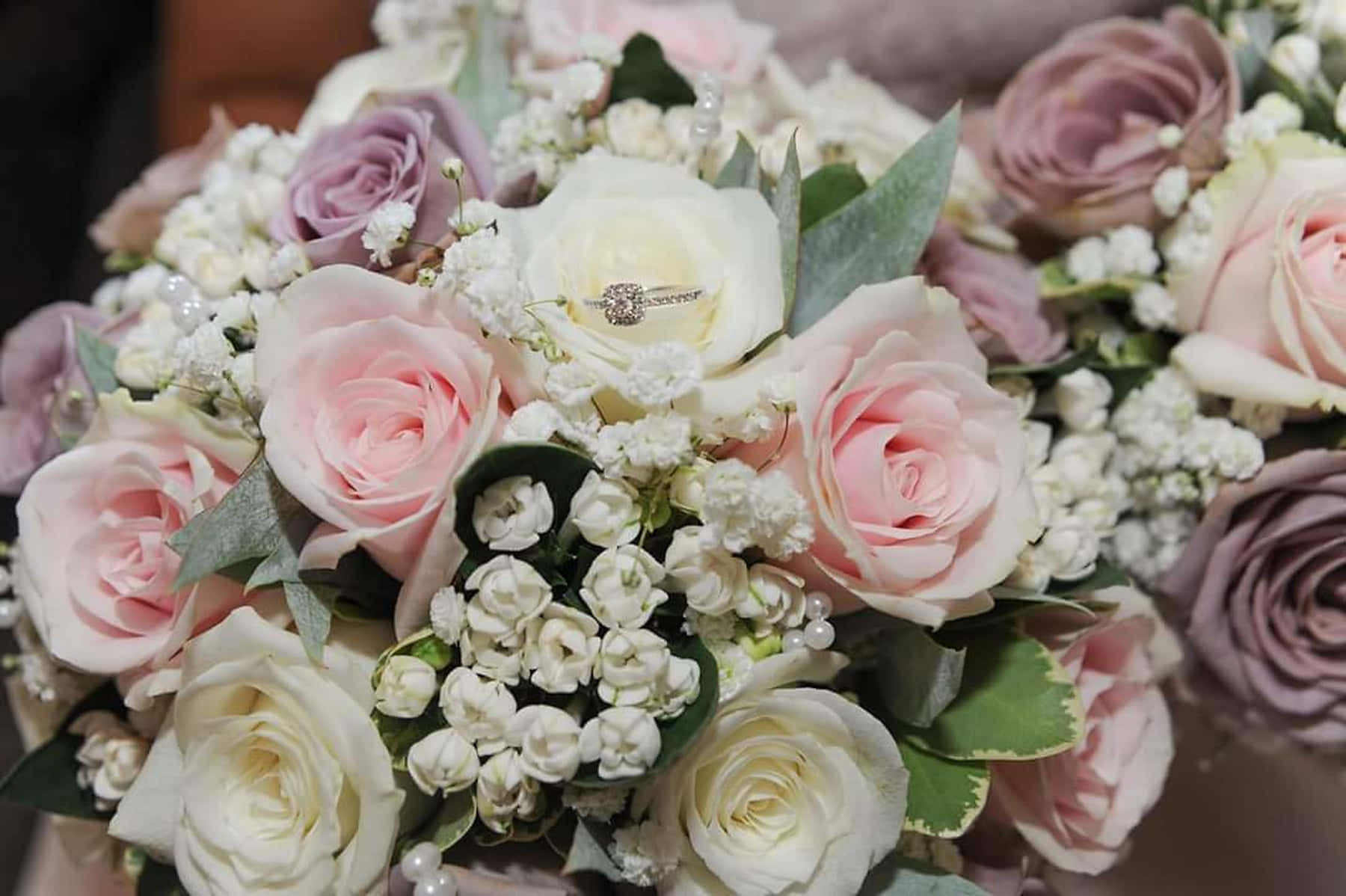 Caption: Elegant Wedding Bouquet in Bride's Hands Wallpaper