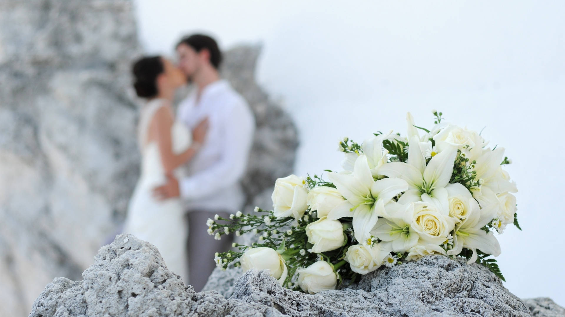 Wedding Bouquet And Kissing Couple Wallpaper