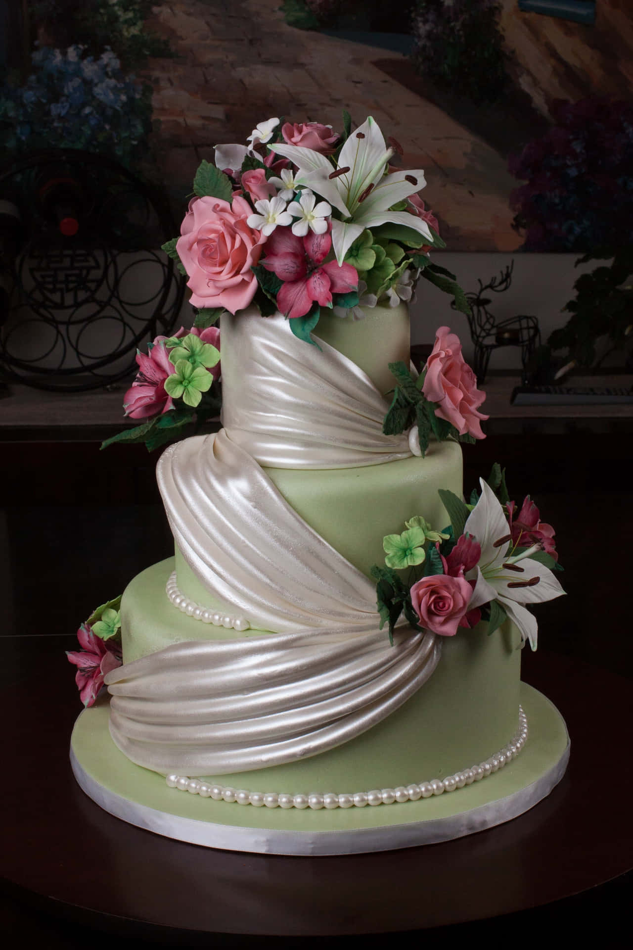 A Green Cake With Flowers