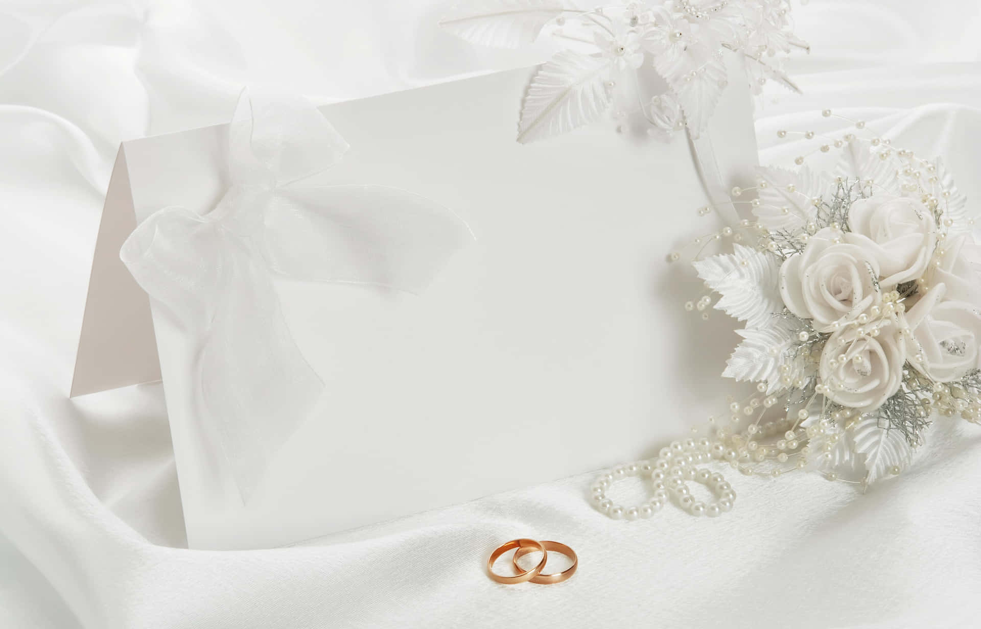 Wedding Invitation Card With Wedding Rings And Flowers