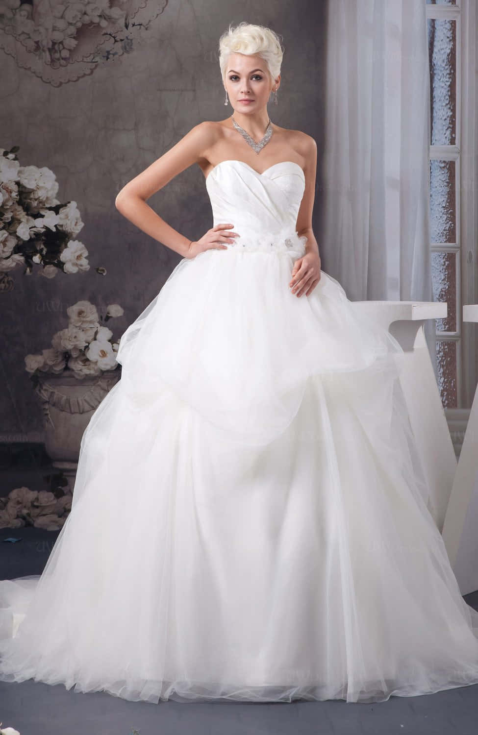 A Beautiful Woman In A White Wedding Dress