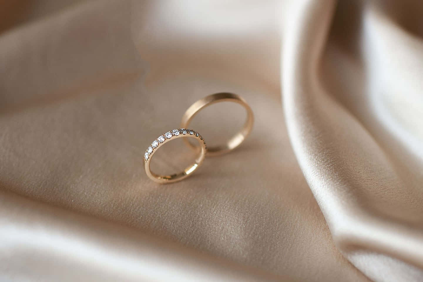 Symbol of true love and commitment - two shimmering wedding rings.