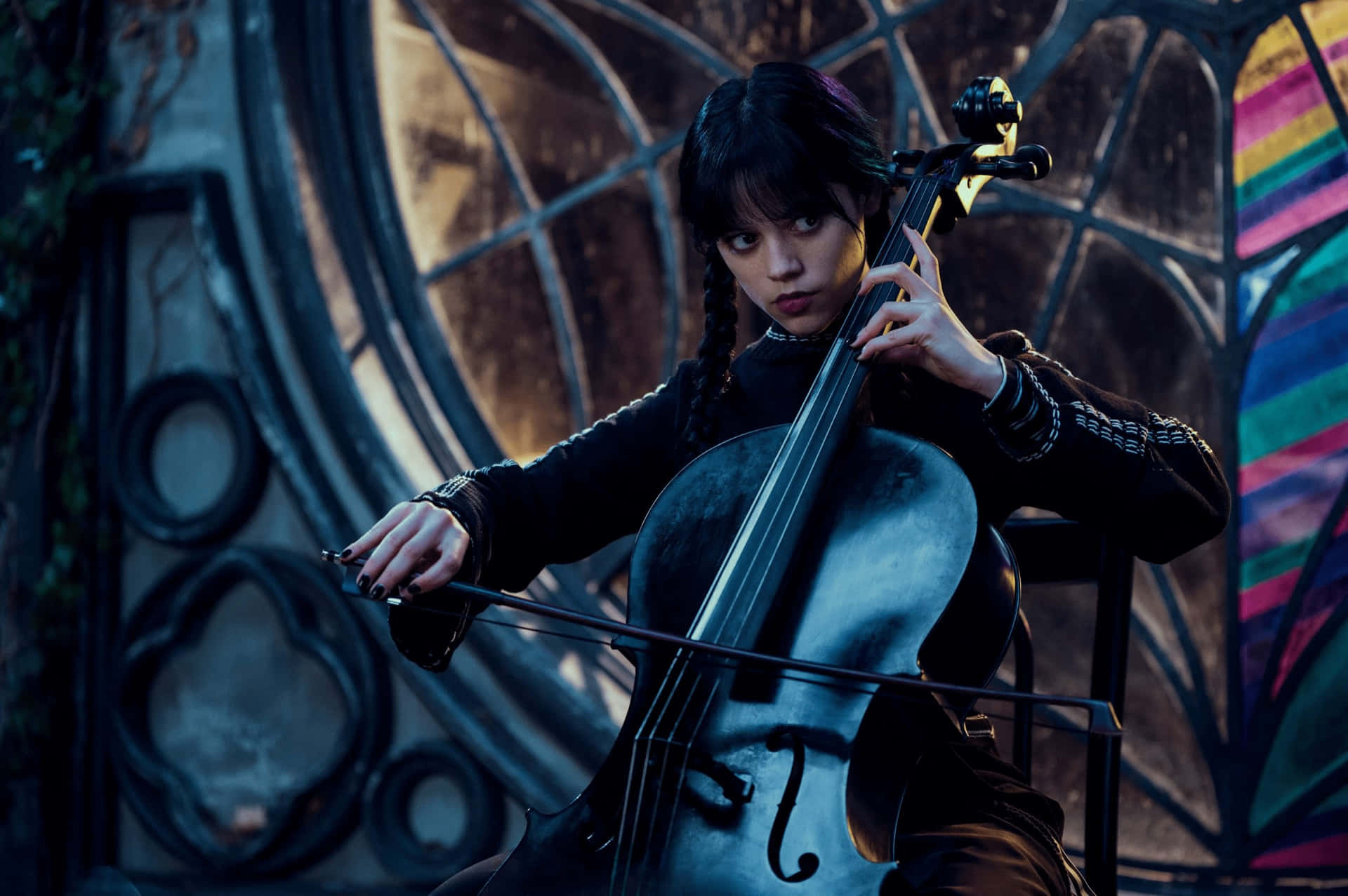 Wednesday Addams Playing Cello Wallpaper