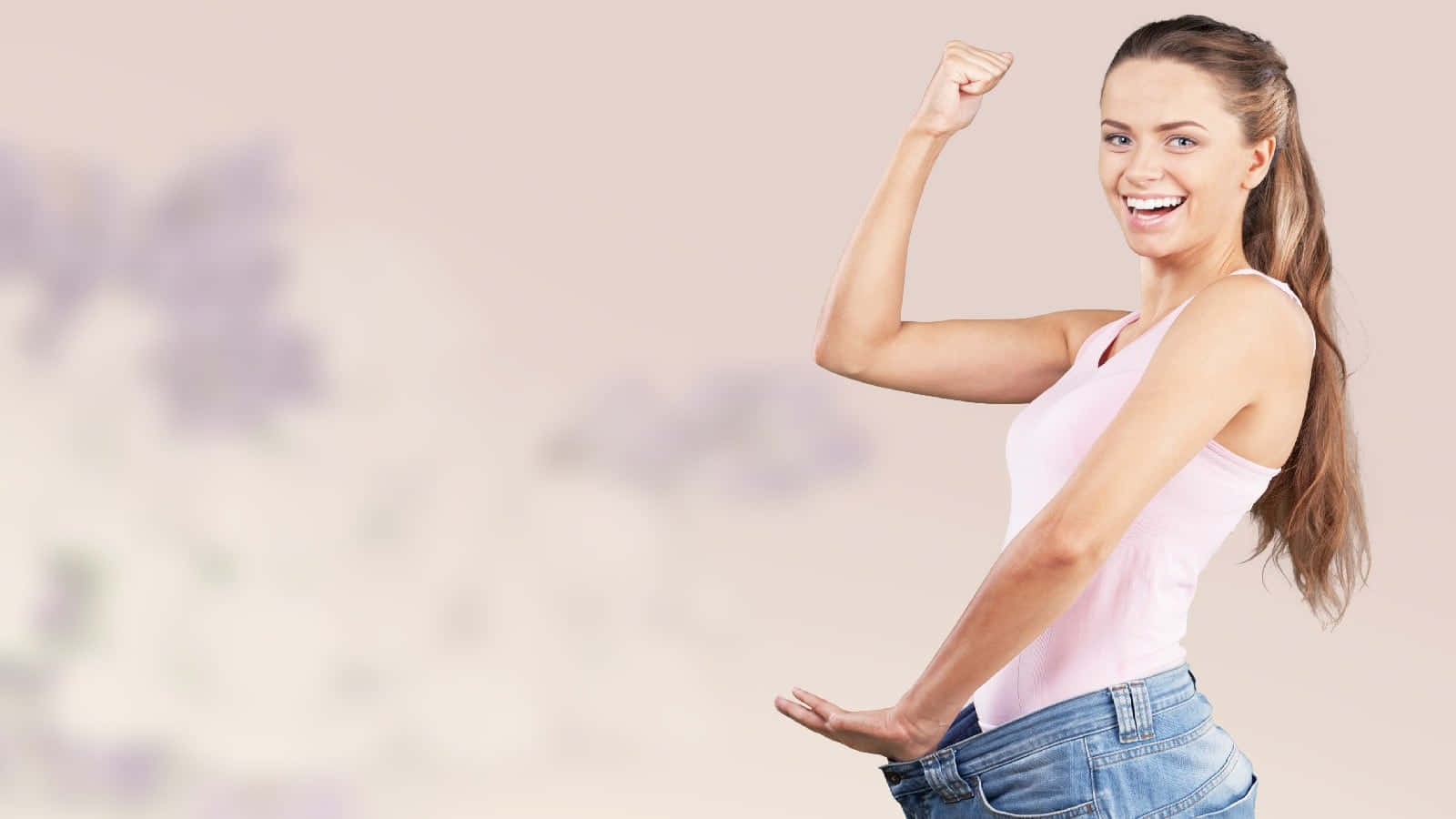 A Woman Is Posing With Her Arms Raised