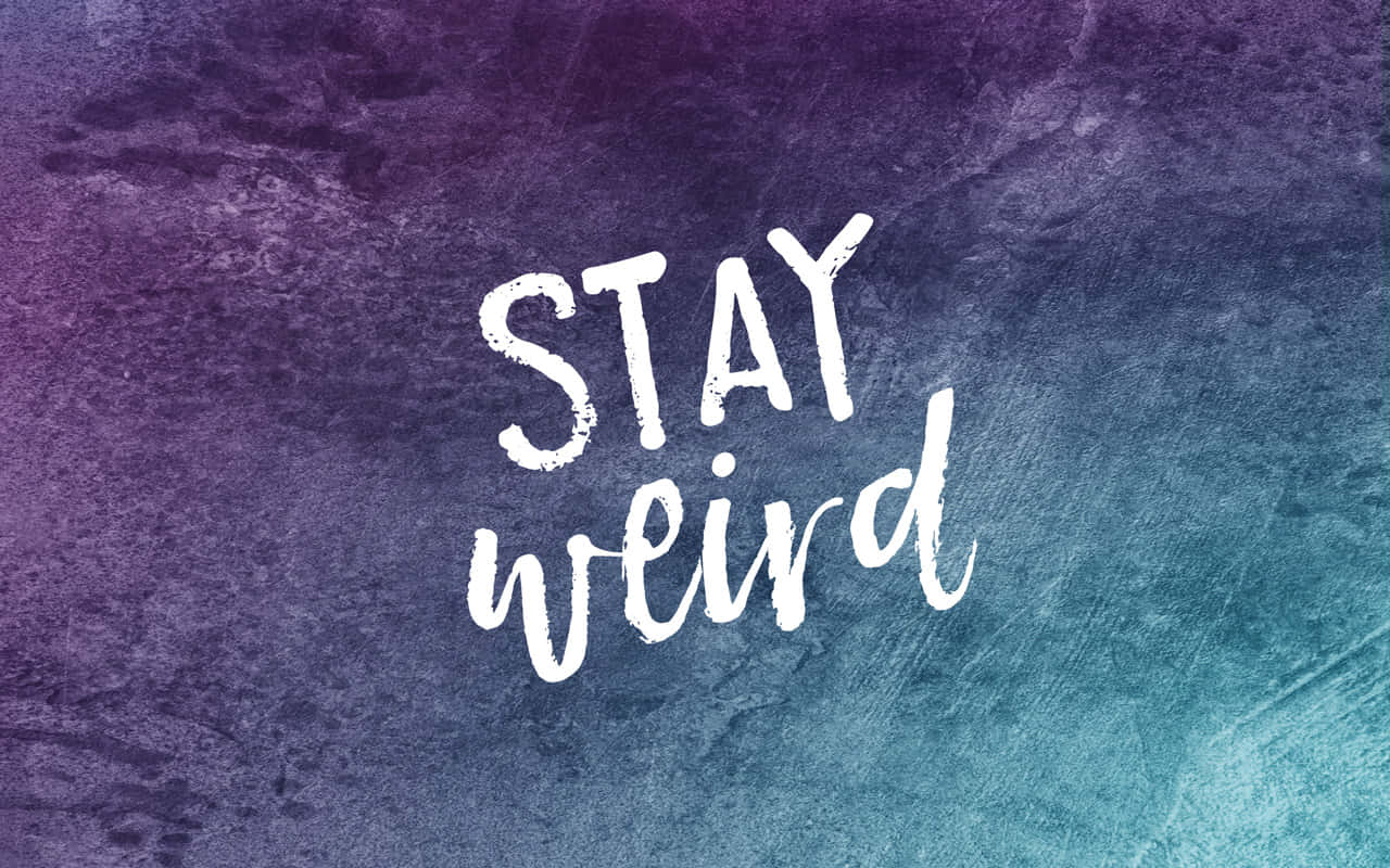 Stay Weird Quote On Blue And Purple Picture