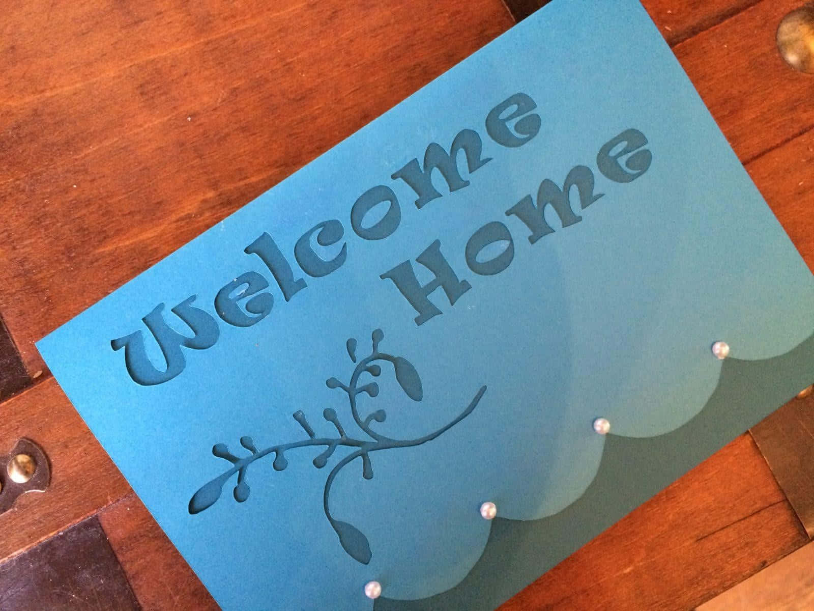 Welcome Home Signon Wooden Table Wallpaper