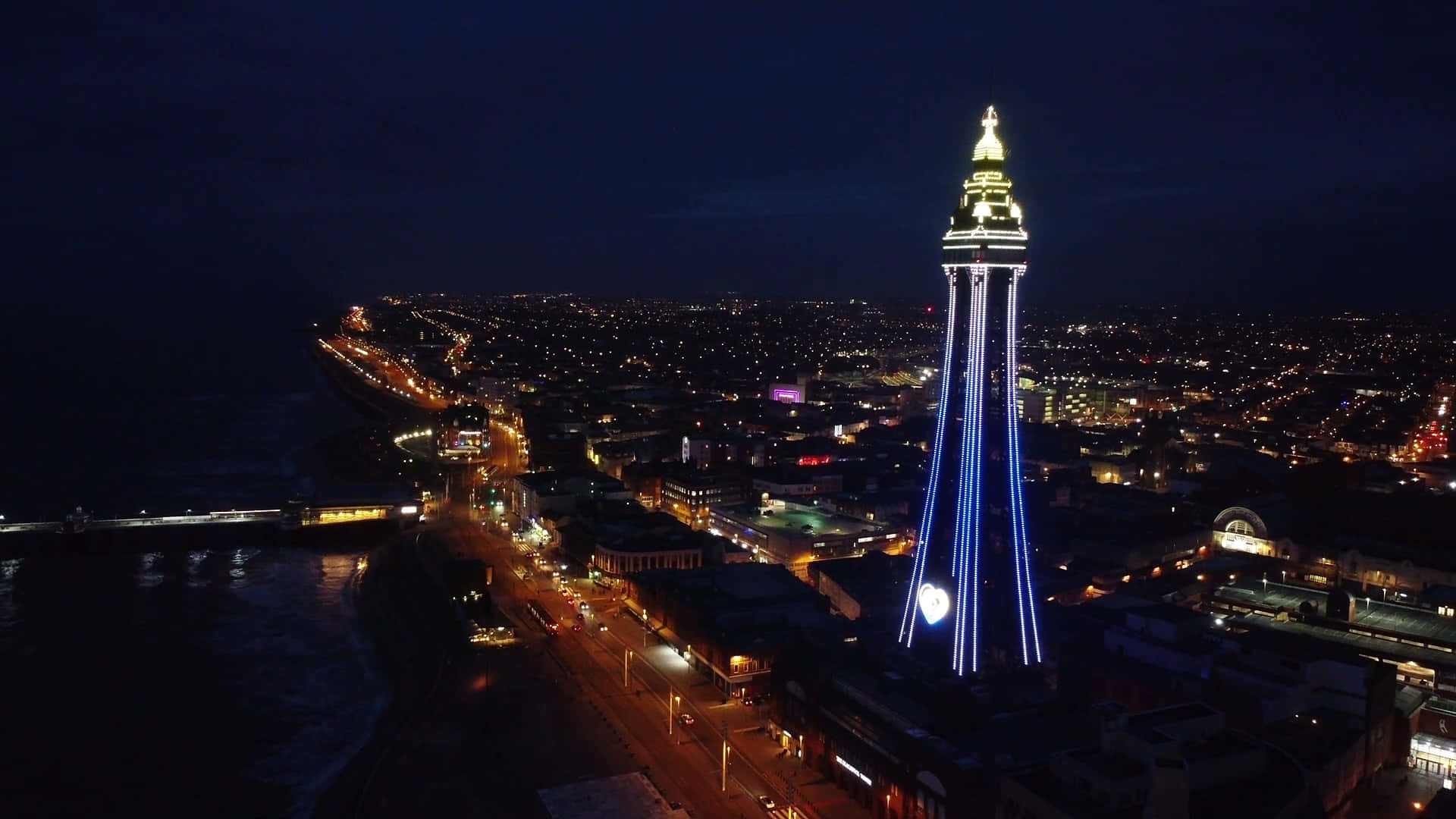 Illuminated Blackpool Tower Against Night Sky Wallpaper