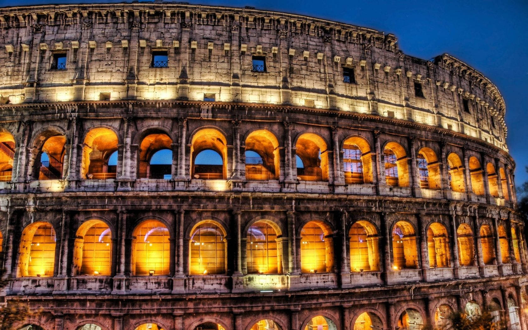 Sfondodesktop Del Colosseo Ben Illuminato Di Notte. Sfondo
