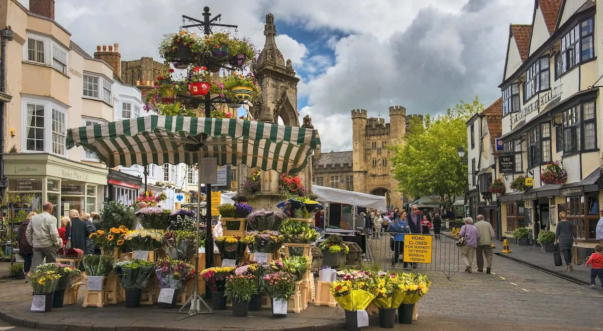 Download Wells Marketplace Flower Stall Wallpaper | Wallpapers.com