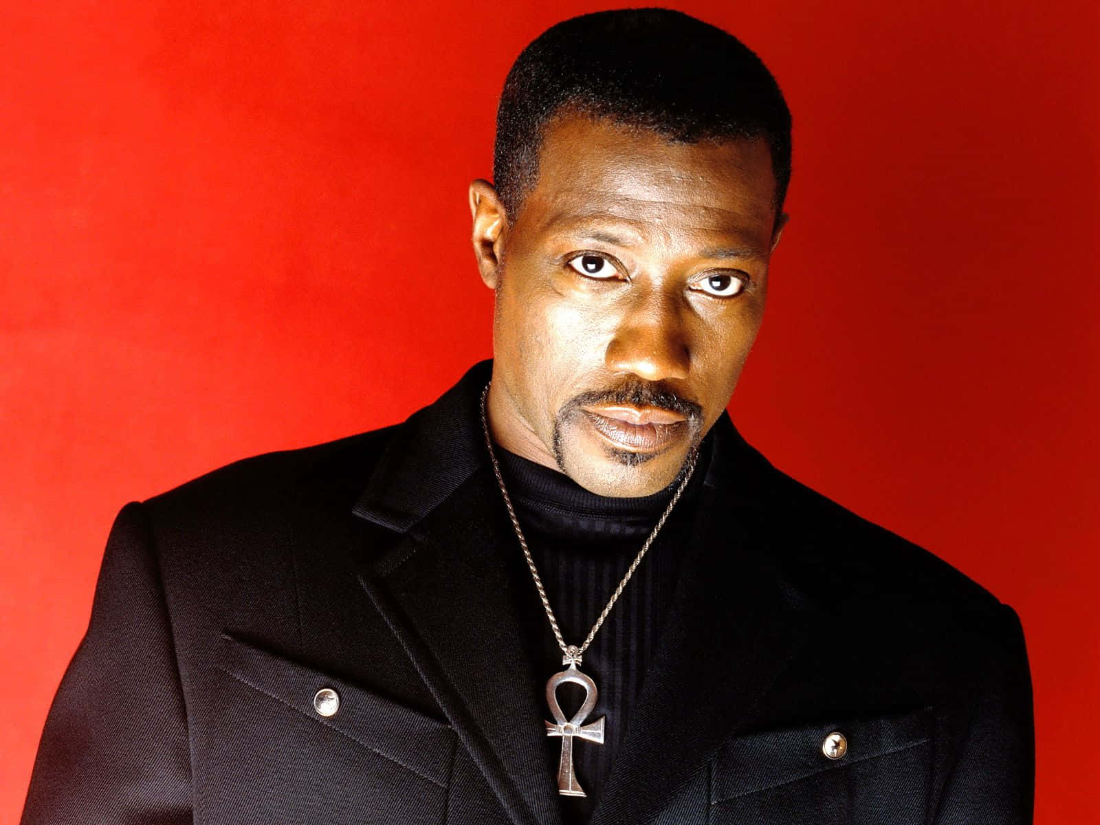 Wesley Snipes in stylish attire Wallpaper