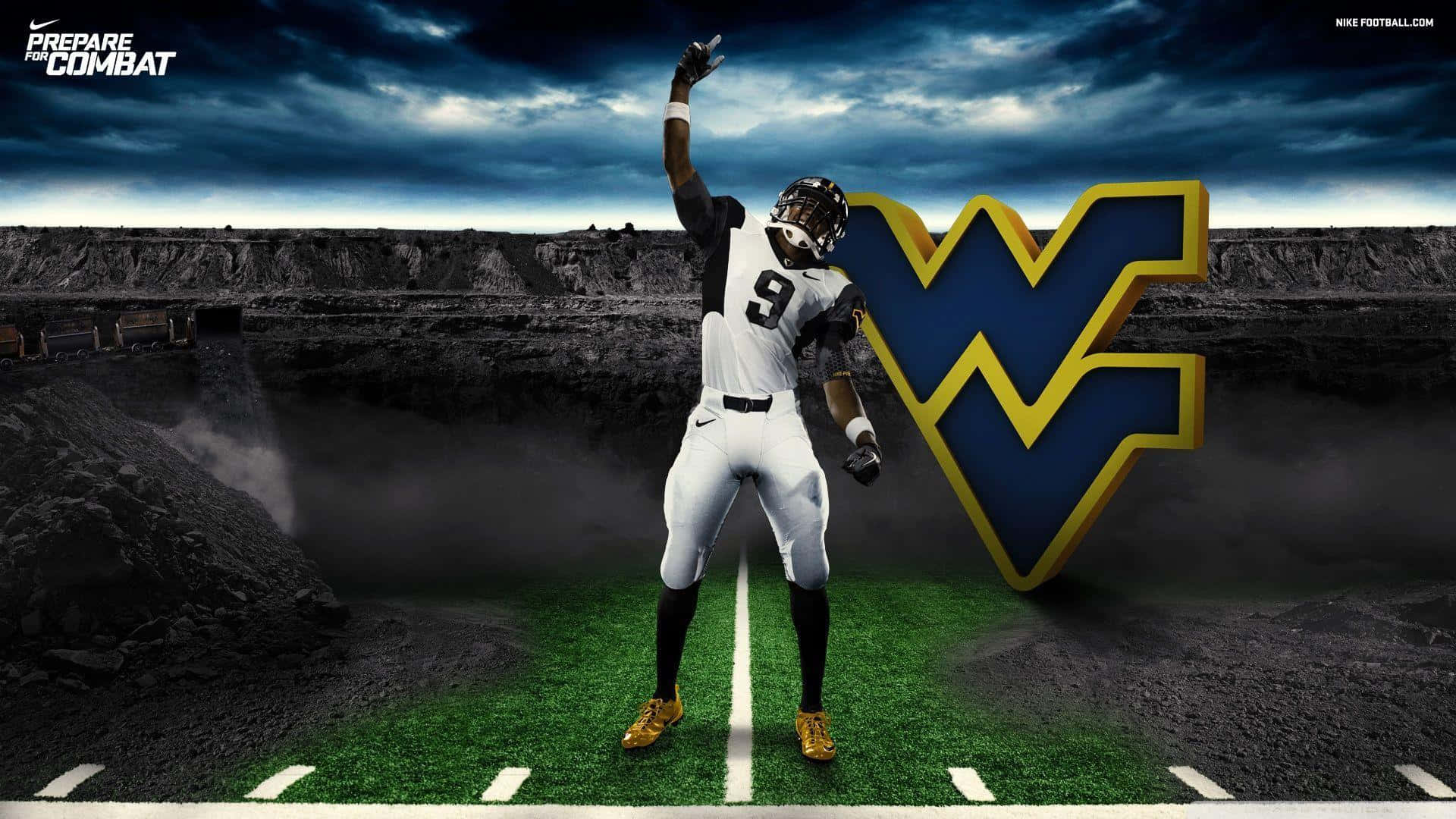 A Football Player Is Standing On A Field With A Helmet Wallpaper