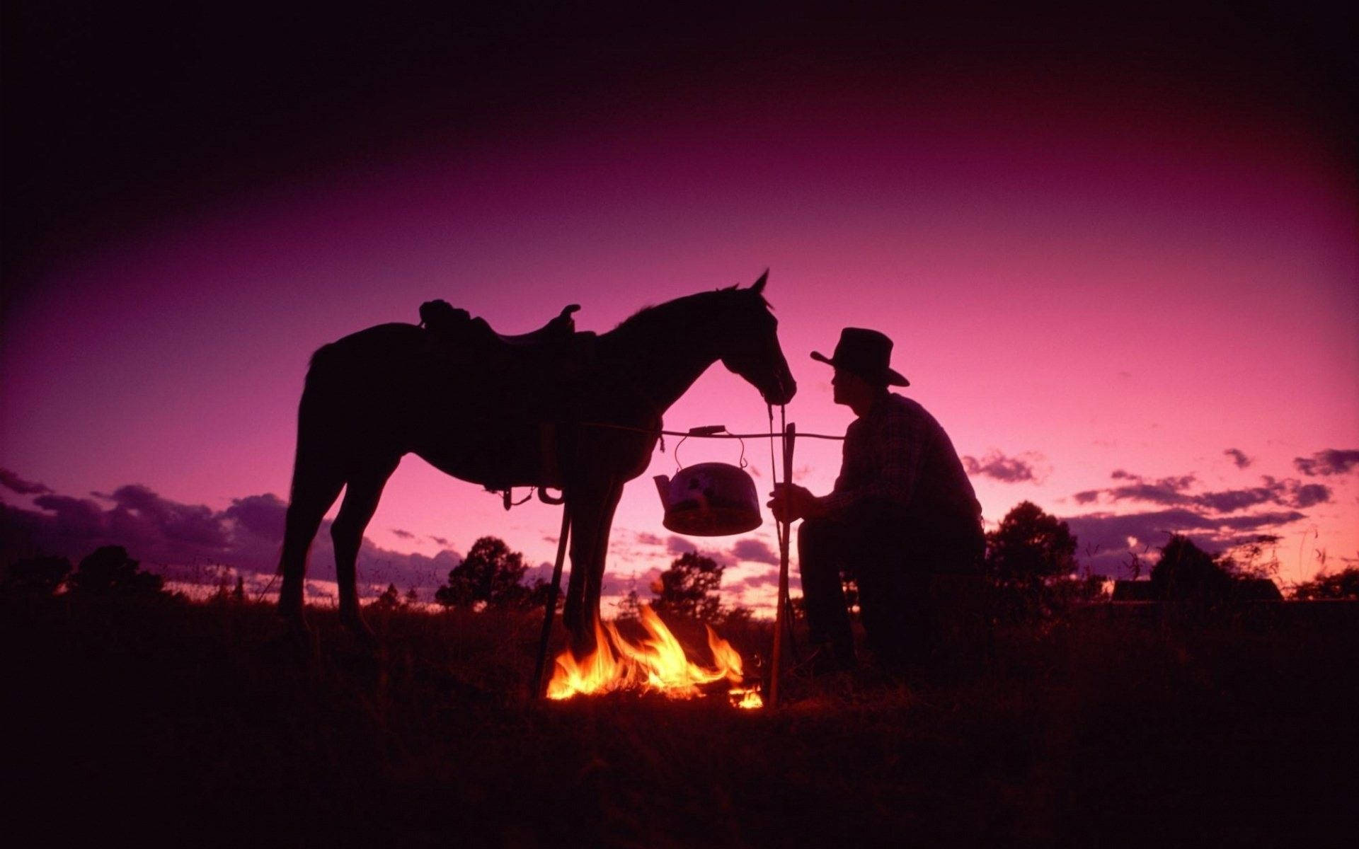 Western Cowboy And Bonfire Wallpaper