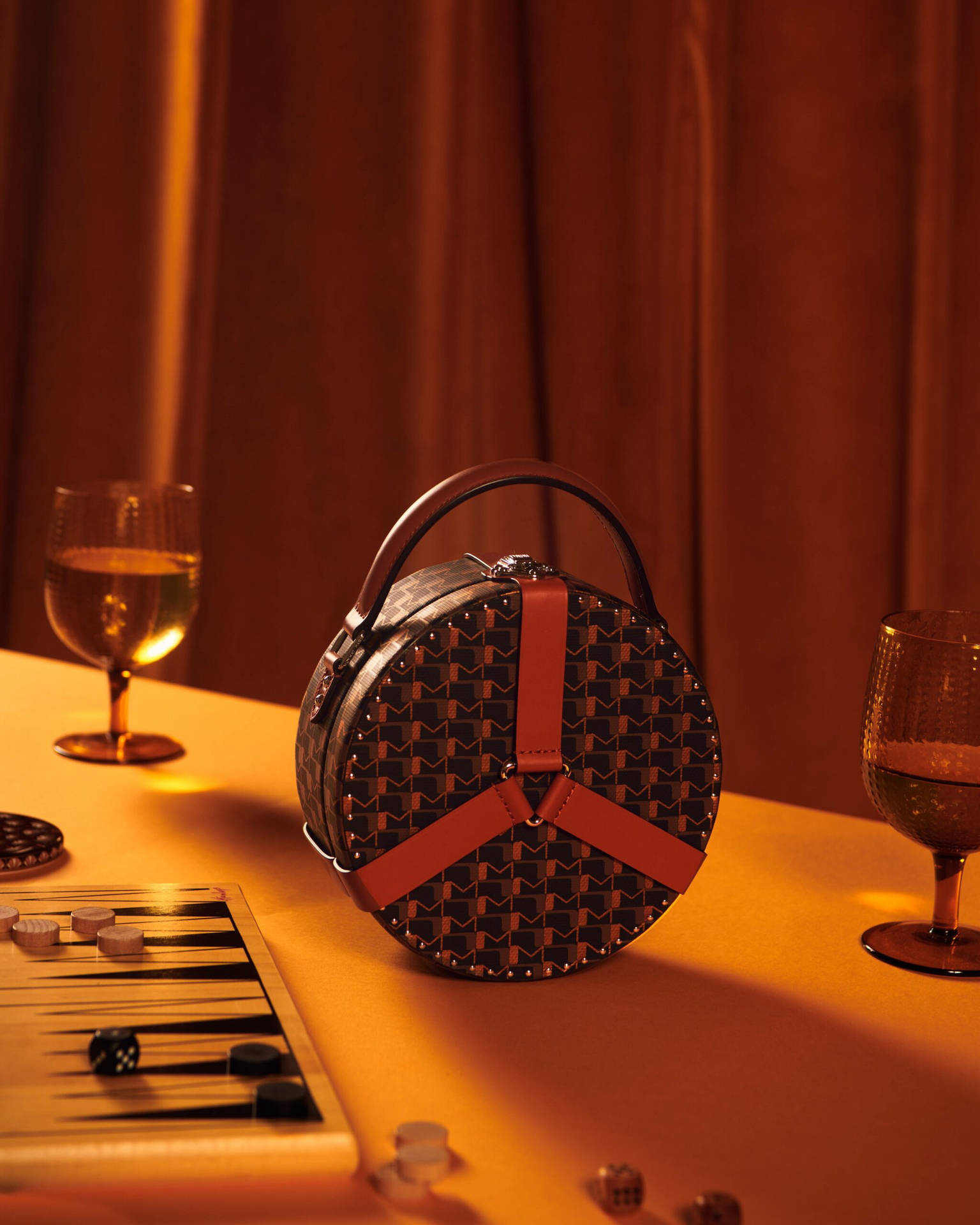 Balance classic style and modern functionality with this stylish Moynat bag Wallpaper