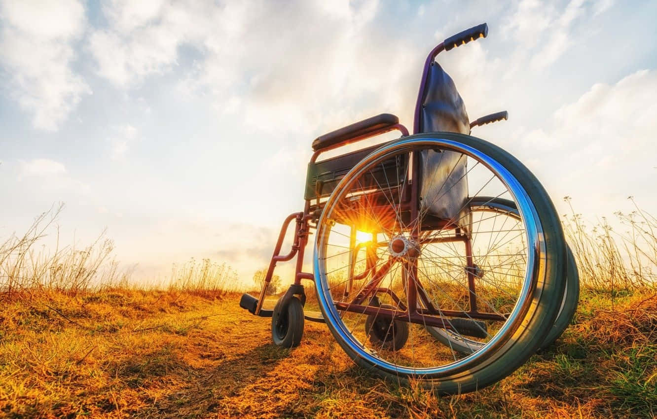 Wheelchairat Sunset Wallpaper