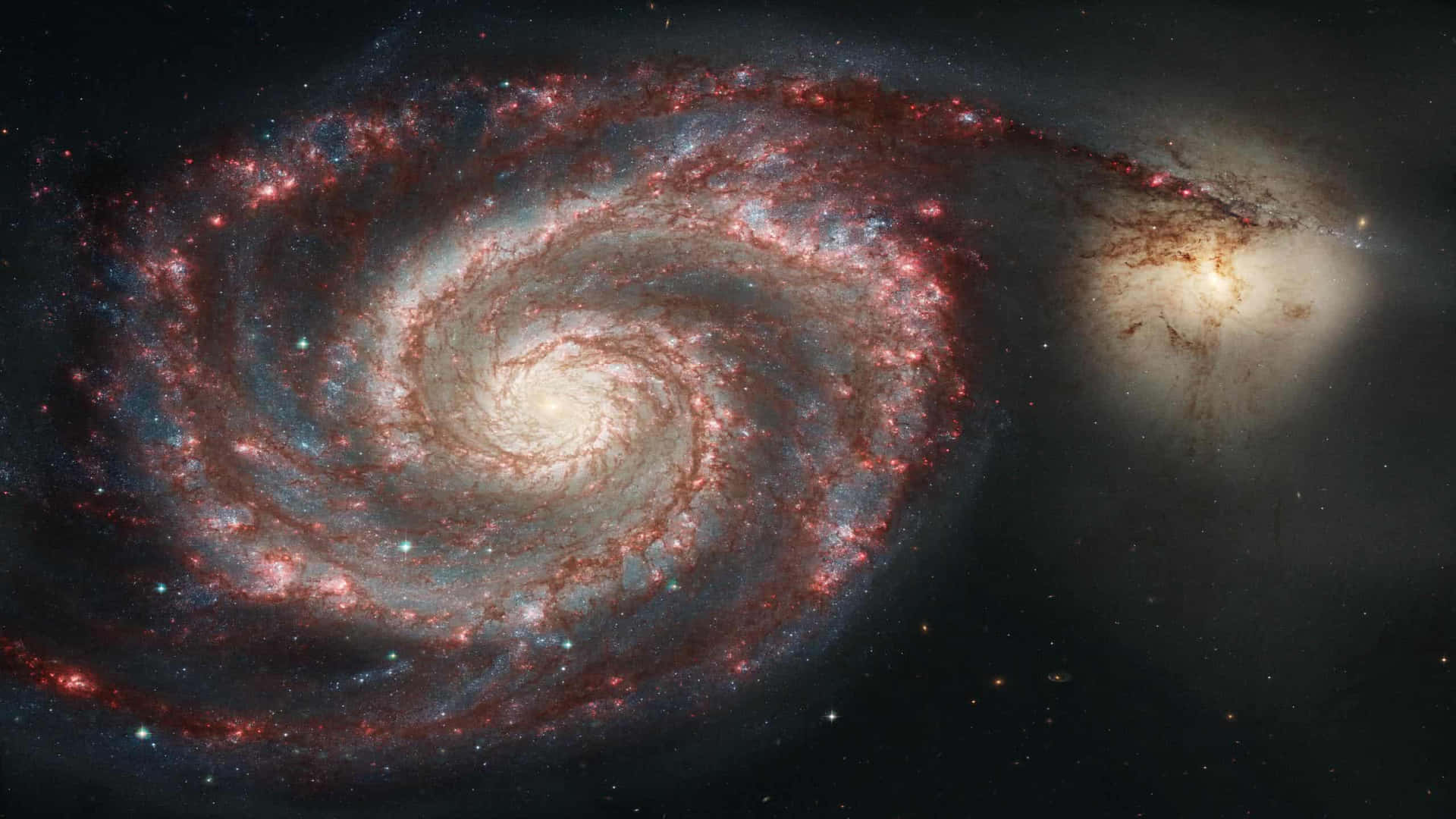 Awe-inspiring view of Whirlpool Galaxy captured in high resolution Wallpaper