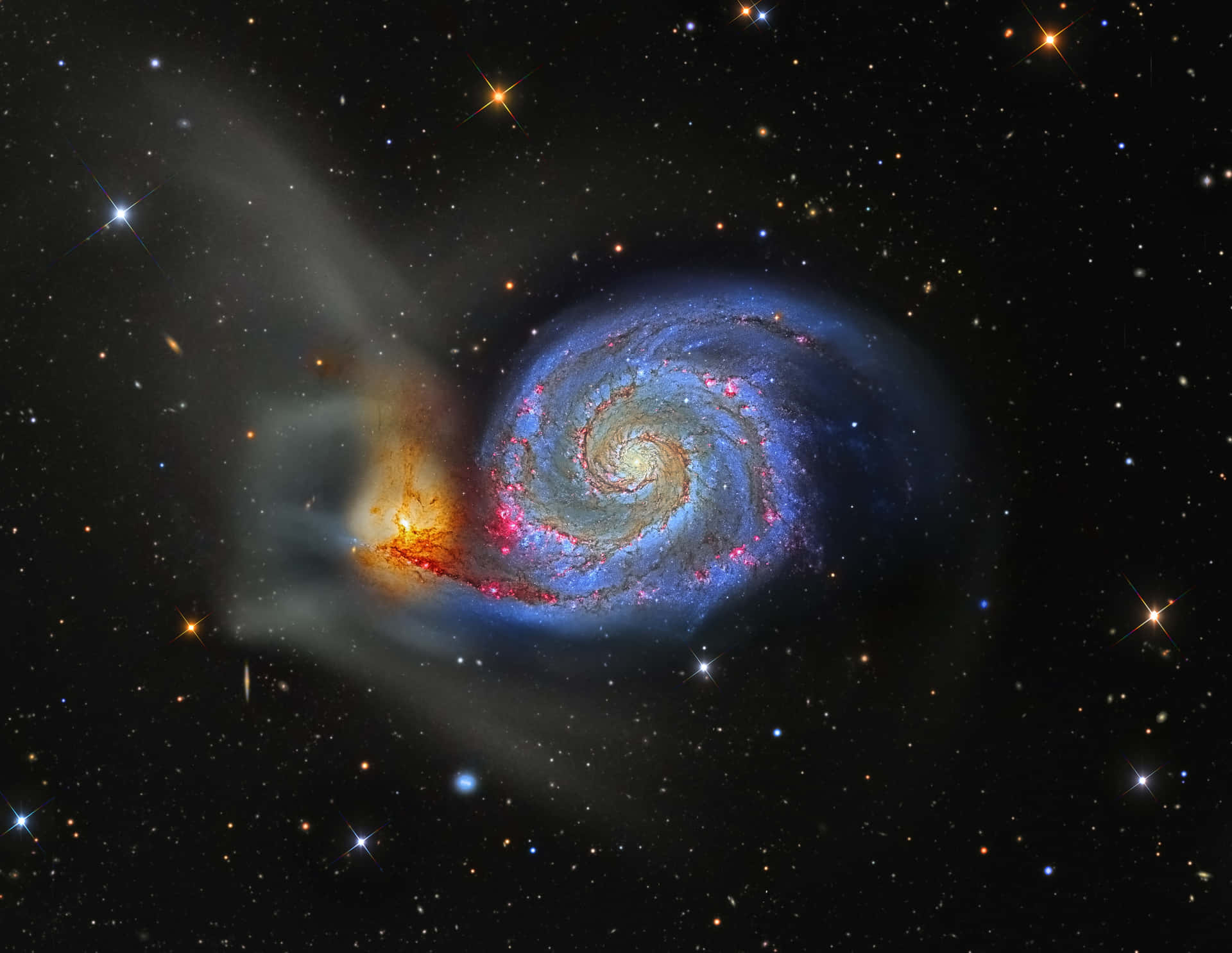 Whirlpool Galaxy: A Beautiful Spiral in Space Wallpaper