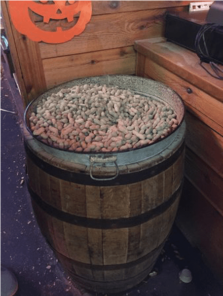 Whiskey Barrel Fullof Peanuts Halloween Decor PNG