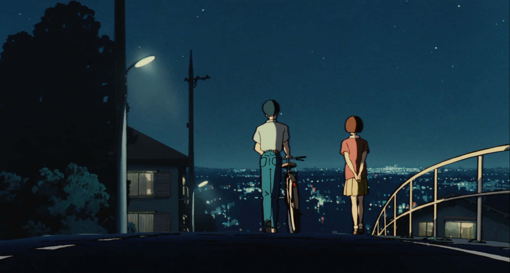 A dreamy scene from Whisper Of The Heart, featuring Seiji and Shizuku gazing at the beautiful cityscape. Wallpaper