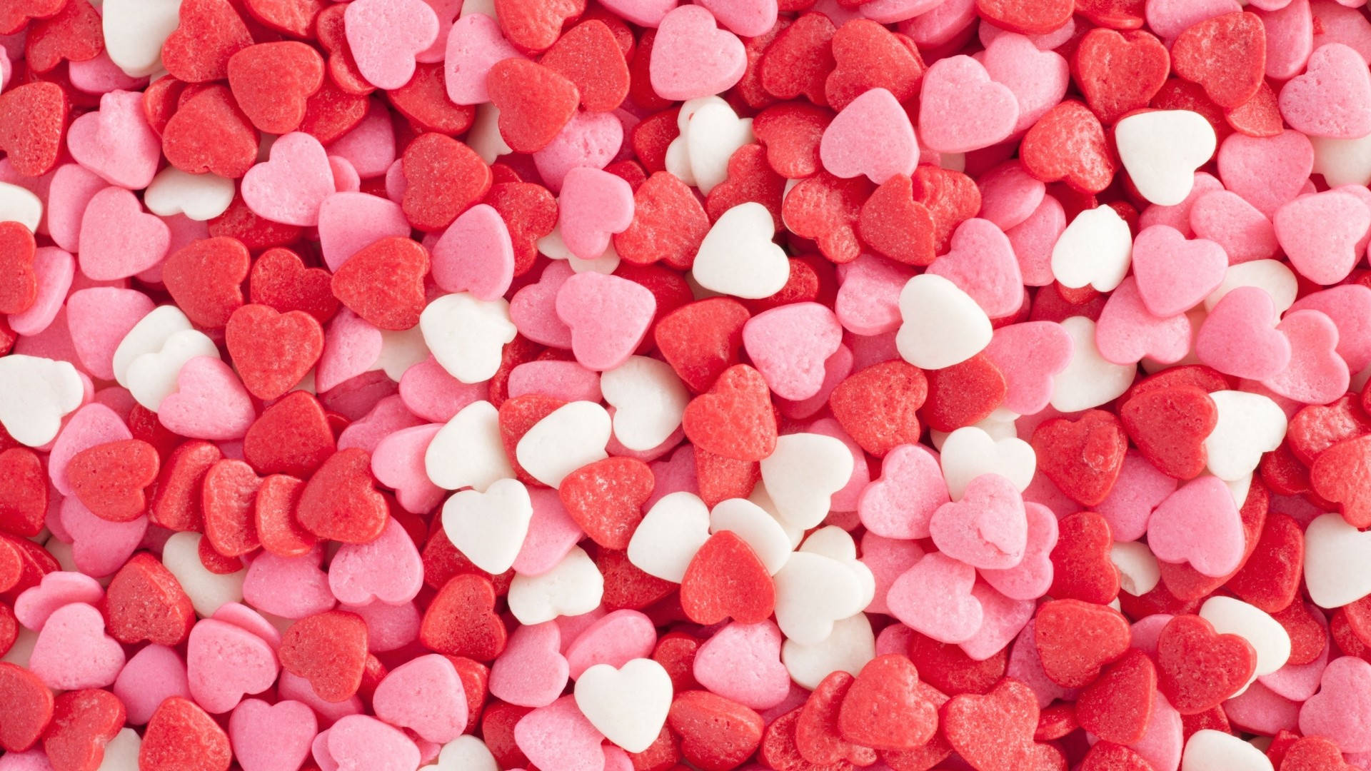 White And Pastel Pink Heart Candies Wallpaper