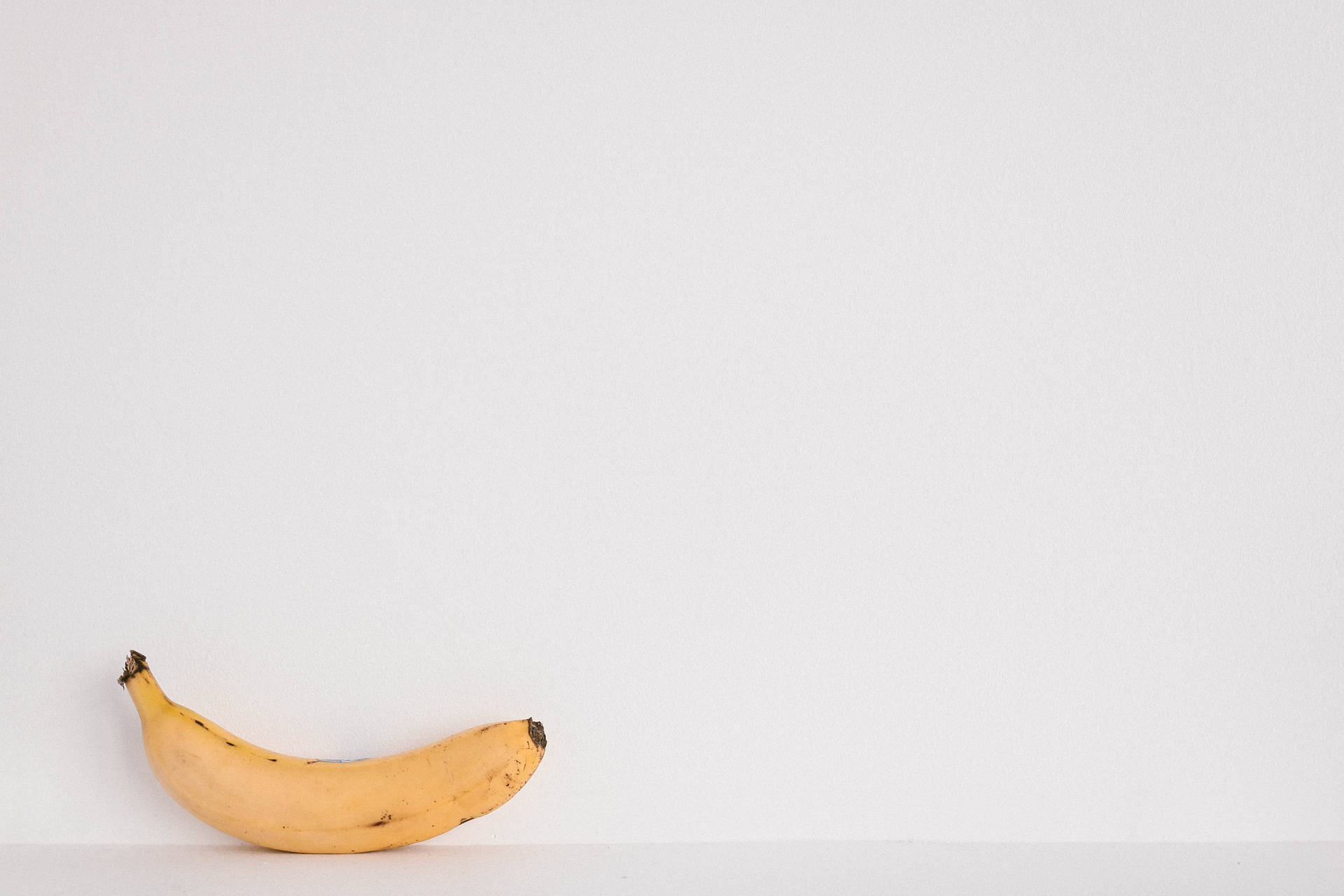White Background With Banana Wallpaper