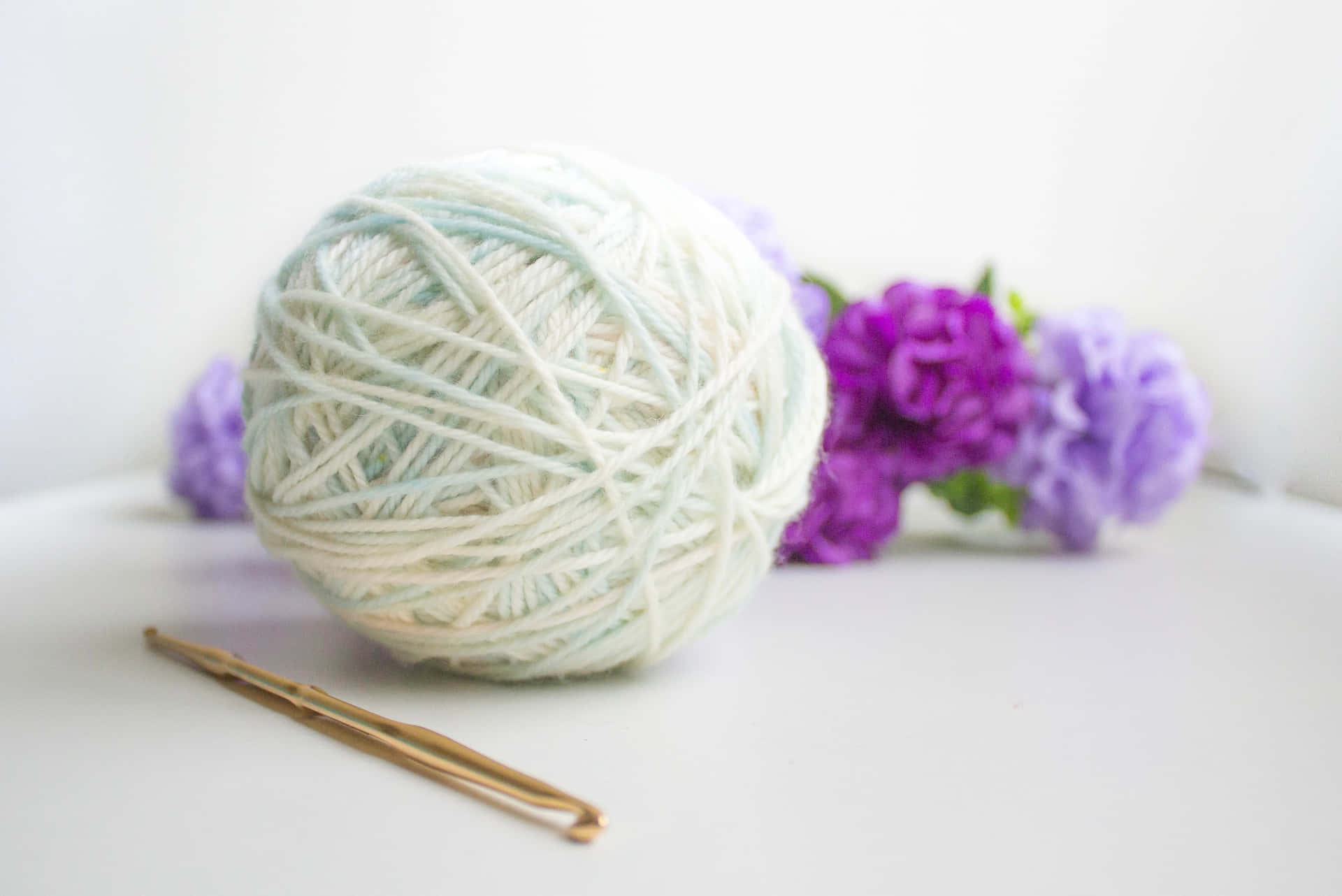 White Ball Of Knitting Wool Wallpaper