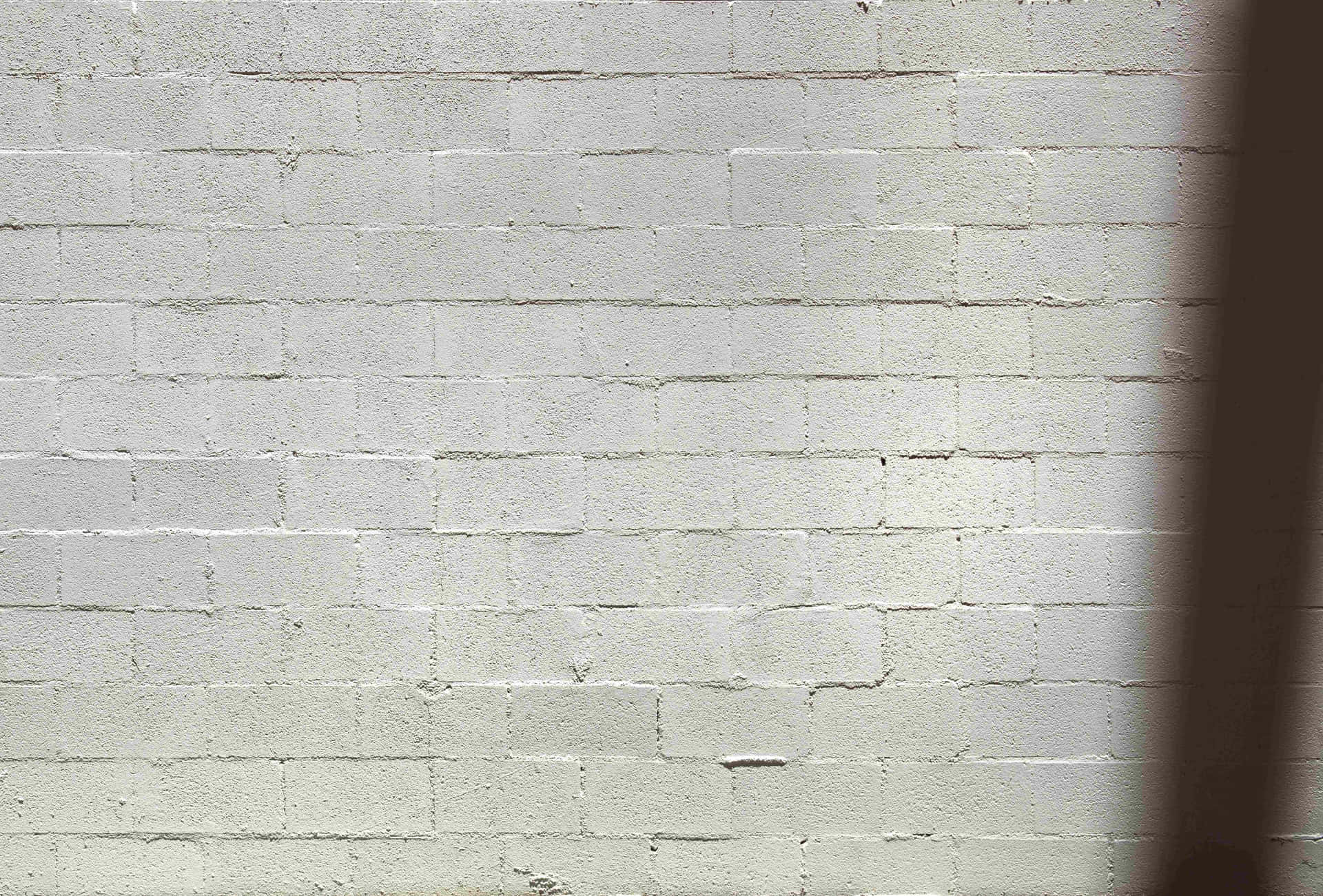 "A Textured White Brick Wall Image"