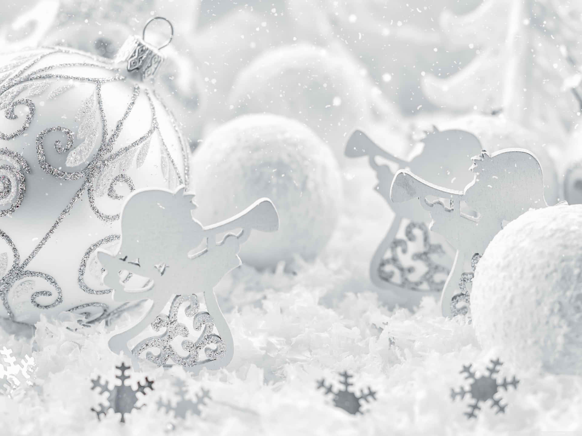 A White Christmas Scene With Ornaments And Snowflakes