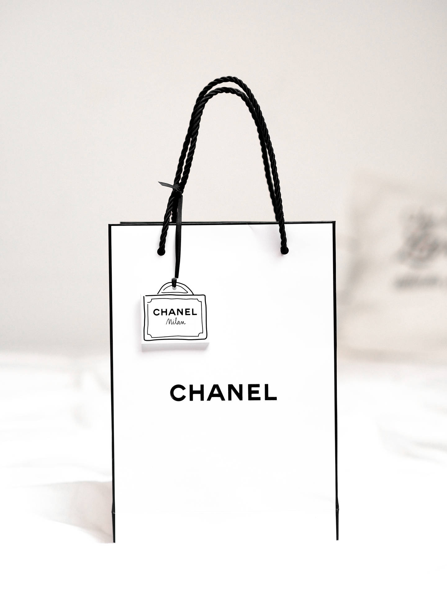 Download White Classic Chanel Paper Bag Wallpaper