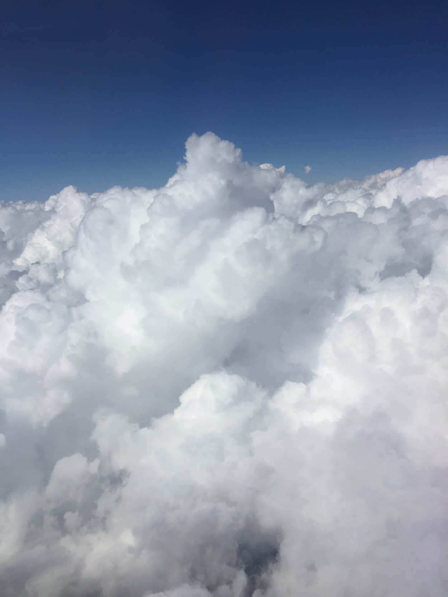 A picture of a vast plush white cloud formation
