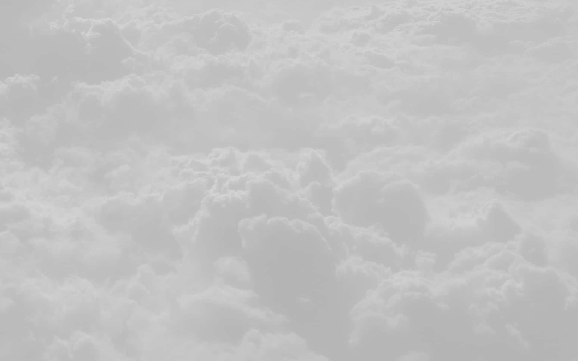 Schwebendunter Den Weißen Wolken Wallpaper