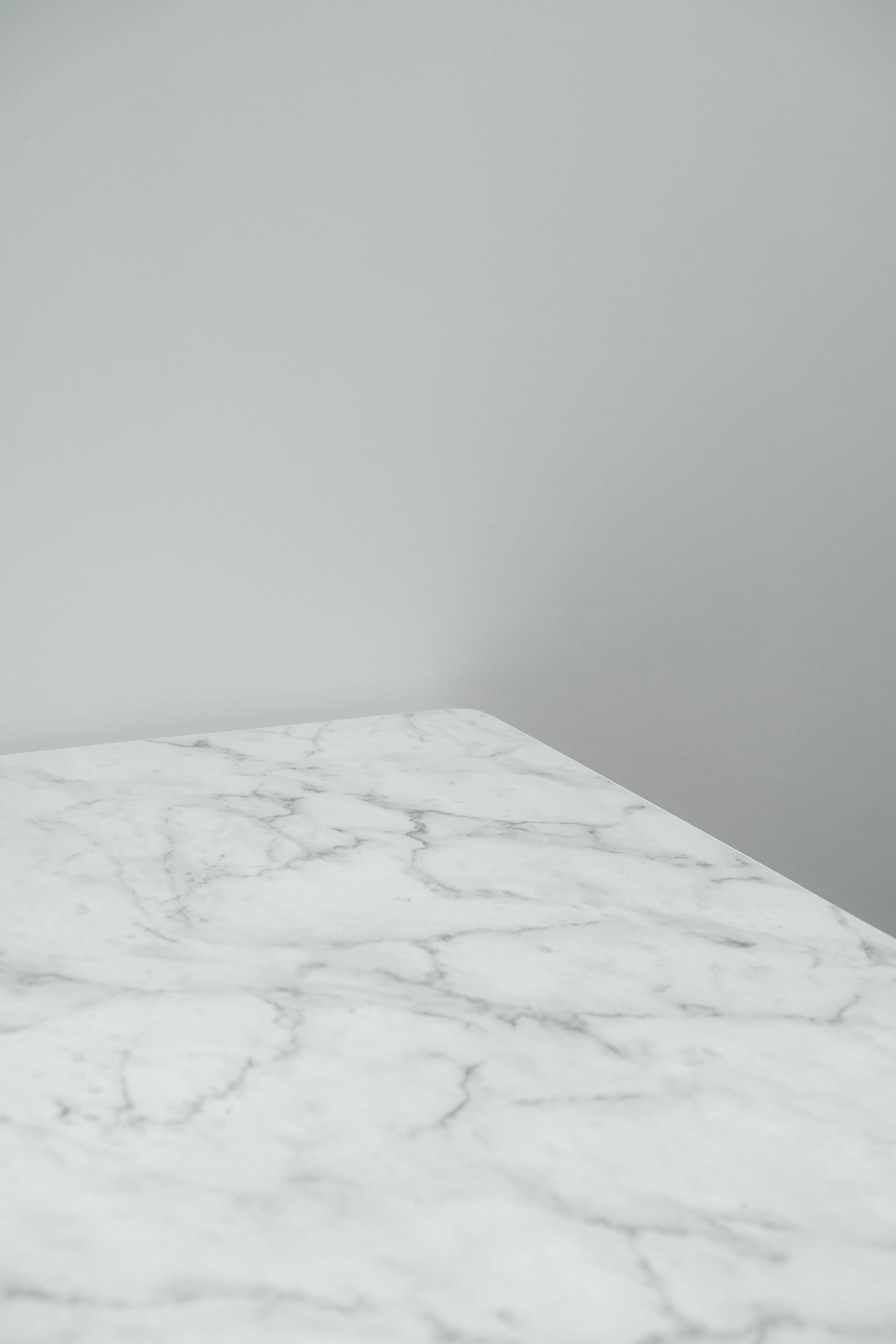 Elegant White Marble Countertop in a Modern Kitchen Wallpaper