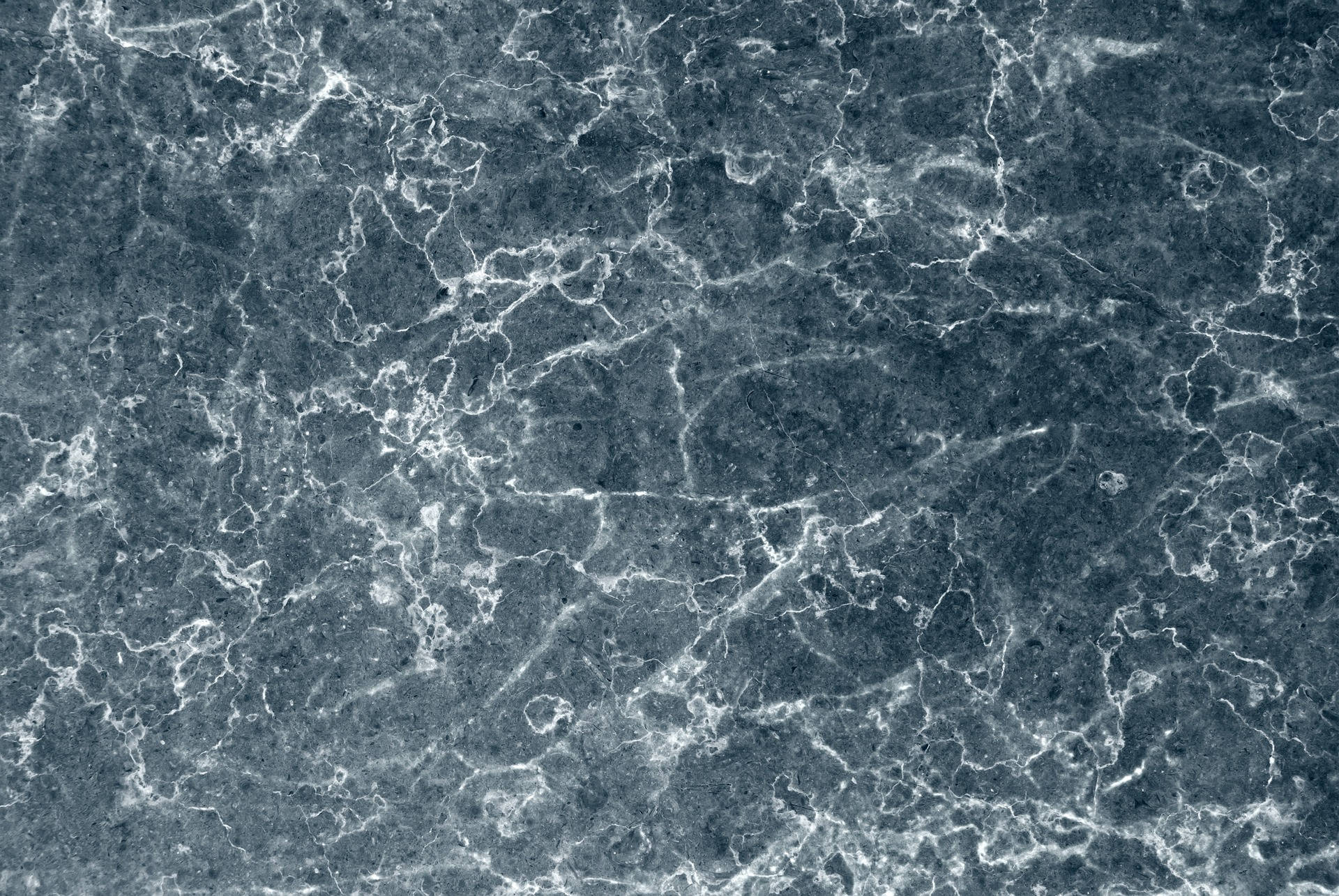 Sophisticated Aesthetics: White Cracks on Blue Marble Laptop Wallpaper